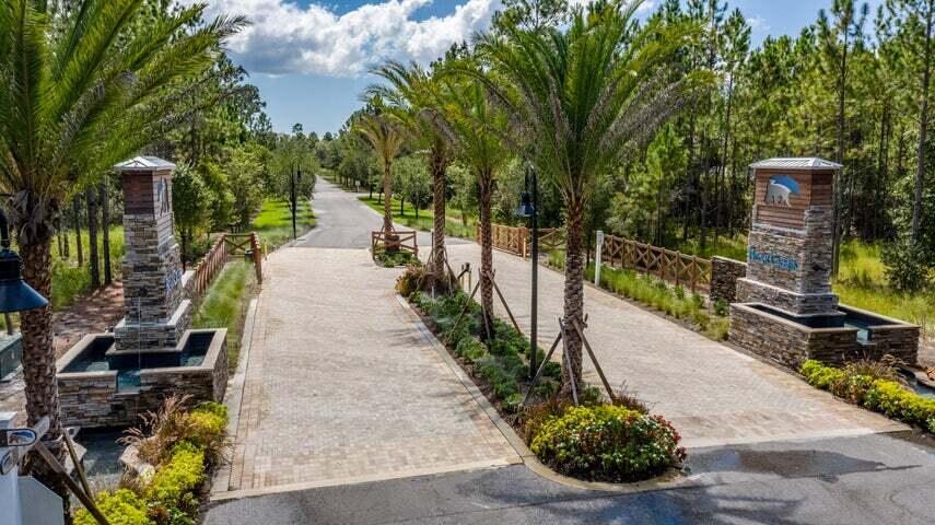 This is an amazing opportunity to build your dream home in the premier community of Bear Creek.  Situated on a quiet creek with trees and privacy. Current amenities include Tennis courts, Pickle ball courts, basketball court, Swimming pool, playground and gym. This is a gated community tucked away among mature hardwood and natural waterways promoting a carefree Florida lifestyle with the advantages of living on the Emerald Coast. This is a non- short term rental community. Conveniently located to shopping, dining, golf, and beaches along 30A. Buyer is responsible for verifying all lot dimensions prior to buying.
