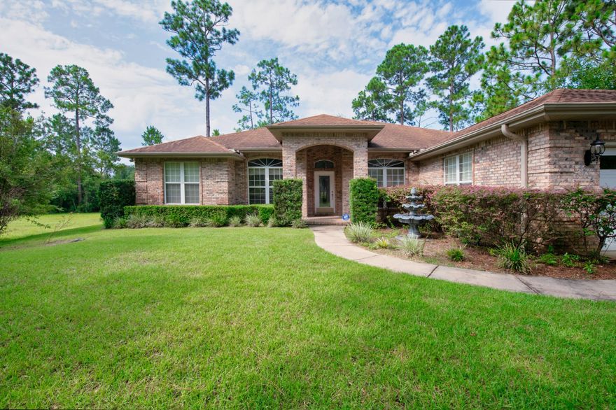 This stunning and well cared for, all brick, custom built lake front home in the quiet subdivision of Shoal Lake is now available, and comes with both immaculate records and a clean home inspection for the new buyer. Upon entry, you will notice details such as crown molding, tray ceilings, chair rails, transom windows and 10' ceilings. You will love the split floor plan with the large master suite, featuring an incredible 5 piece bathroom with garden tub and large walk-in shower, off of the kitchen and the additional bedrooms and bath on the opposite side of the home offering plenty of privacy.The kitchen, featuring granite countertops, designer backsplash and a gas stovetop, offers plenty of cabinet and counter space and opens to eat in kitchen.