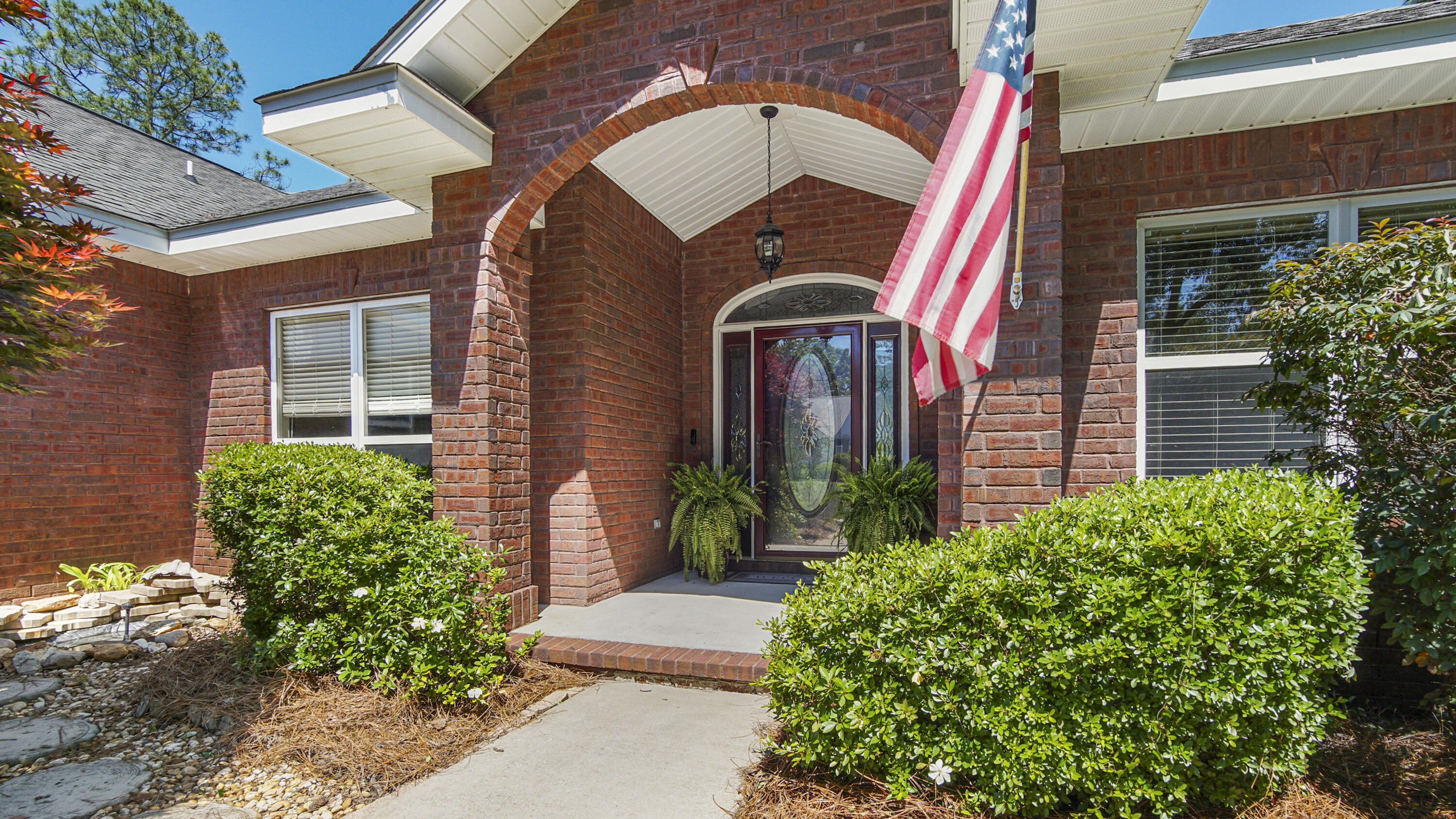 Prepare to check off all the boxes! Custom waterfront home in popular Magnolia Lake Estates with an unbeatable layout and truly blissful water views from the roomy screened porch. The kitchen features newer appliances, breakfast bar and pantry; but the real showstopper is the ingenious butler's pantry with abundant cabinetry and extra prep space. You'll find storage in spades with closets tucked thoughtfully throughout. Entertaining is easy w/ formal dining as well as a breakfast area overlooking the lake. The large waterfront master suite shines, with a fantastic walk-in closet, as well as an unexpectedly large cultured marble walk-in shower. Experience the peaceful & calming views in this very walkable neighborhood with a single entrance for added privacy