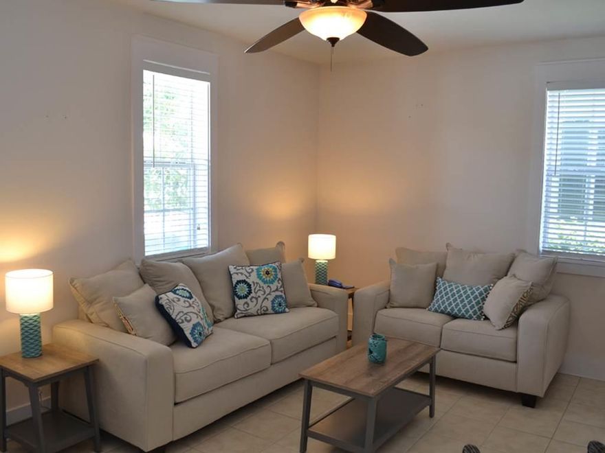 Perfect getaway cottage located in Seagrove Beach makes a great home, second home, or vacation rental. Just a quick walk to the pristine Beaches of South Walton. Beach access is directly across County Hwy 30A at Somerset Bridge Road. This home is a two story, 2 bedroom, 2.5 bath Florida Cottage with an open kitchen, living, dining area on the ground floor. The kitchen is appointed with stainless steel appliances and a large breakfast bar. The bedrooms are on the second level; both have private baths and access to the private balcony overlooking the community pool. Recently updated; light and bright, including new interior paint. Stackable Washer/Dryer unit including. The landscaping is green and tropical!