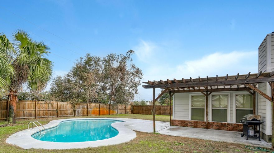 Multiple offers received. Fully renovated 3/2 brick home with pool for under $300K!  Located just 8 miles west of Hurlburt, a perfect place to spend your evenings and weekends enjoying your backyard paradise.  Dine alfresco under your wood pergola or lounge around the inviting gunite pool surrounded by tropical landscaping and palm trees. There's also plenty of room for kids/pet play areas in the large back yard. The beautiful Navarre beaches are just 3 miles away over the bridge. This floorplan has a great flow for families and entertaining with a formal dining room, kitchen nook and breakfast bar as well as a second living area. The living room features vaulted & beamed ceilings and a grey wash brick wood burning fireplace. The recently updated kitchen has lovely wood cabinets, light grey & white stone counters, white subway tile backsplash, & stainless-steel appliances.  Plantation shutters throughout thee except the Florida room which has bamboo style blinds.  The master bathroom features gorgeous mosaic tile work in the glass shower and a double vanity while the hall bathroom has a tub/shower combo with unique mosaic tile as well. The indoor laundry room is just off the kitchen and doubles as an extra storage/pantry area.  The 2-car garage has an area for a workshop or storage too!! Washer and dryer negotiable.
Brand new roof, 2020 Gas hot water heater; 2017 HVAC, 2017 sprinkler systemgunite pool/deck refinished 2017, all appliances, cabinets, vanities, and light fixtures less than 4 years old!  
All information is deemed reliablebuyer to verify any information deemed important to includebut not limited tomeasurements, sq ft, etc.  
