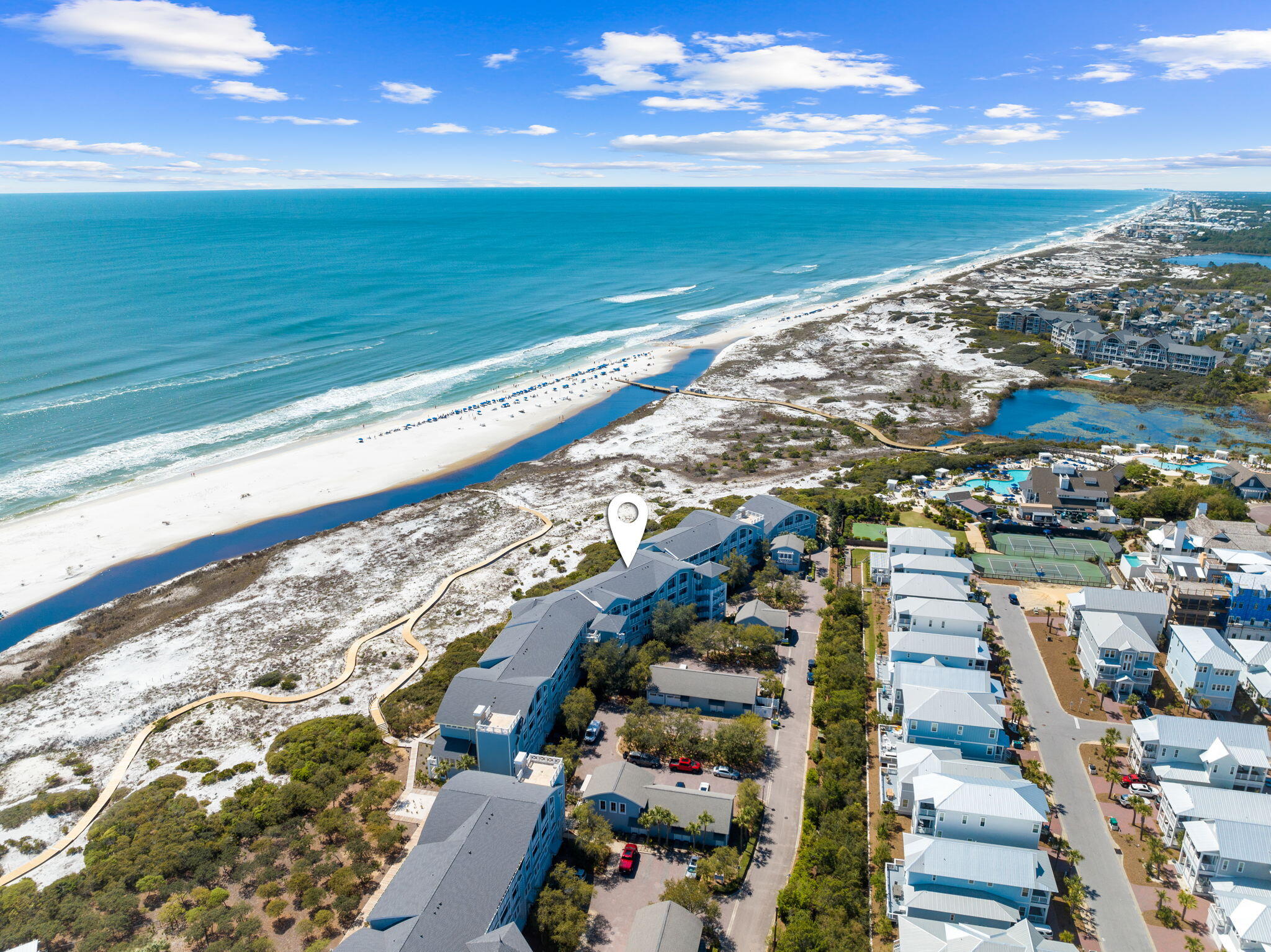 Designed by the acclaimed Graham Gund Architects, the residences at South Bridge Lane reinterpret coastal vernacular in a way that embraces the stunning landscape while inspiring a new vision of waterfront living. The low-density complex is strategically positioned behind the crystalline white sandy beaches and established dune vegetation offering short views of the local habitat and long views out to the sea. This highly sought-after floor plan spans two levels with over 2,100 square feet of thoughtfully designed living space in addition to an attached garage.