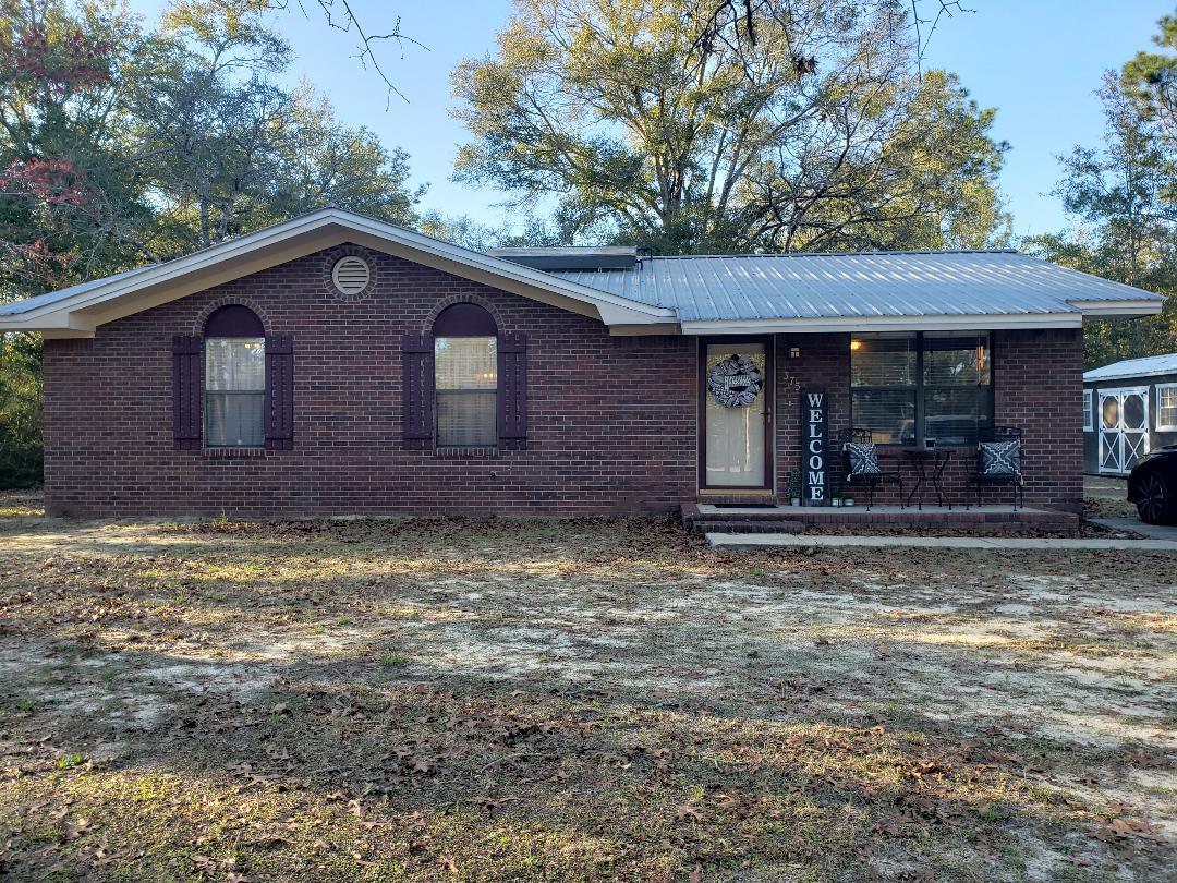 HIGHEST AND BEST DUE BY 7PM ON 3/5/ 2021. LOOKING FOR A GREAT BUY IN THIS HOT MARKET - THIS IS A GREAT DEAL!!! LOCATED JUST NORTH OF TOWN ON A PAVED ROAD SURROUNDED BY ALL NICE HOMES AND JUST MINUTES BACK TO TOWN. 3 BEDROOMS, 1 AND 1 1/2 BATH BRICK HOME ON 1.3 ACRES. HOME HAS A GREAT LIVING ROOM, A LARGE OPEN KITCHEN WITH EAT IN DINING ROOM, THE FULL BATH OFFERS AN AMAZING TILE SHOWER AND HOME HAS BEEN UPDATED AND UPGRADED. THE MASER SUITE OFFERS THE PERFECT HALF BATH AND ALL ROOMS ARE OF GREAT SIZE. THE LAUNDRY ROOM OFFERS LOTS OF STORAGE AND OPENS TO A FENCED BACK YARD WITH A LARGE ABOVE GROUND POOL AND A GREAT COVERED PATIO. HOME HAS A PAVED DRIVE WAY AND ALSO INCLUDES A GREAT YARD BUILDING. SEE THIS ONE TODAY!!!