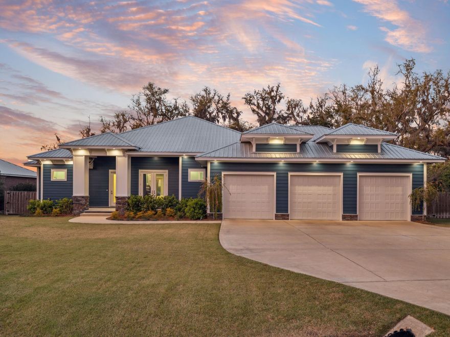 Experience luxury waterfront living in this custom-built 2021 home, perfectly situated on 0.74 acres with 110 feet of direct Bay access. Designed for comfort, convenience, and breathtaking views, this 4-bedroom, 5-bathroom residence offers deep water access (4-6 feet year-round), a private dock with a boat lift, and a saltwater pool.For boating enthusiasts, the private dock and boardwalk provide direct access to the Bay. The dock has been updated with a new electrical system, snap jackets on the dock posts for durability, city water access, and floodlights on a timer. The boat lift has a weight rating of 7,500 pounds with an 11-foot height clearance, along with a floating dock for two Jet Skis. A private boat ramp on the property allows for easy access to the water, ideal for launching kayaks and paddleboards. 
The outdoor amenities are truly exceptional, featuring a 30'x15'-foot saltwater pool with both heating and cooling capabilities, as well as an ultraviolet sanitation system. The pool house includes a full outdoor bathroom, NatureKast cabinetry with a lifetime warranty, an outdoor sink, cabinets, and a generous storage room. The home offers plenty of outdoor living space, including a spacious screened-in porch (30' x 18') with a stained wood ceiling and color-changing LED lighting.
This home features a gourmet kitchen with GE Caf?? appliances, a pot filler, under-cabinet lighting, and a built-in wine fridge. The dining area offers stunning Bay views with seating for 8-10. The luxurious primary suite includes Bay views, two walk-in closets, and a spa-like en suite with a soaking tub and an oversized shower with multiple shower heads. Every bedroom has its own en suite bathroom, with one guest bathroom featuring a tub and another guestroom offering Bay views. Smart home technology includes app-controlled HVAC and garage doors, along with an integrated Eclipse speaker system throughout the home and back patio. Ample storage is available with three garages, attic space, and a mudroom/laundry combo that includes built-in office space.
For those seeking the ultimate waterfront lifestyle, this home offers boating, paddleboarding, fishing, and entertaining at its finestall with no HOA restrictions. A 25-foot boat and jet skis are available for purchase to make your move seamless.
Don't miss out on this Bayfront gem! Schedule your private tour today.
