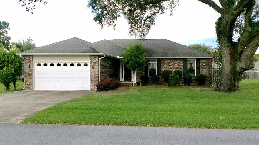 Great house in a great neighborhood! A MUST see!! Four bedroom, two bath in excellent condition. Owner custom built the home in the fall of 2006. Cathedral ceiling in the living room. Large master bath with a sit down vanity and a huge walk in master closet. Beautiful covered back patio for entertaining. There is a park one street down from the house. Breathtaking oak tree shades the front yard, plus a well maintained sprinkler system. The lot has an extra wide driveway for parking and a bigger than normal garage. Ceilings throughout are nine feet, along with a cathedral ceiling in the living room. Plus, an oversized garage door which allows for many options of storing things in the garage, such as a small camper. Schedule a tour today!