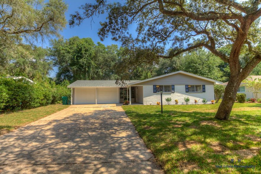 Come see this beautiful 3 Bd / 2 Ba home in one of the most magnificent locations in Fort Walton Beach. Majestic oak trees grace this lot located in a well established waterfront neighborhood. This home has been renovated from top to bottom and features an open concept floor plan. There is a new roof, HVAC system and lawn pump for the fully landscaped front yard. The kitchen features new cabinets with full extension drawers and GRANITE counters with STAINLESS STEEL appliances. The kitchen is open to the dining area and living room and has beautiful views towards the water. The main areas feature hand scraped wood look laminate floors while the bedrooms feature new plush carpeting. The master bath features a new custom stand up tile shower along with a new vanity with storage drawer.