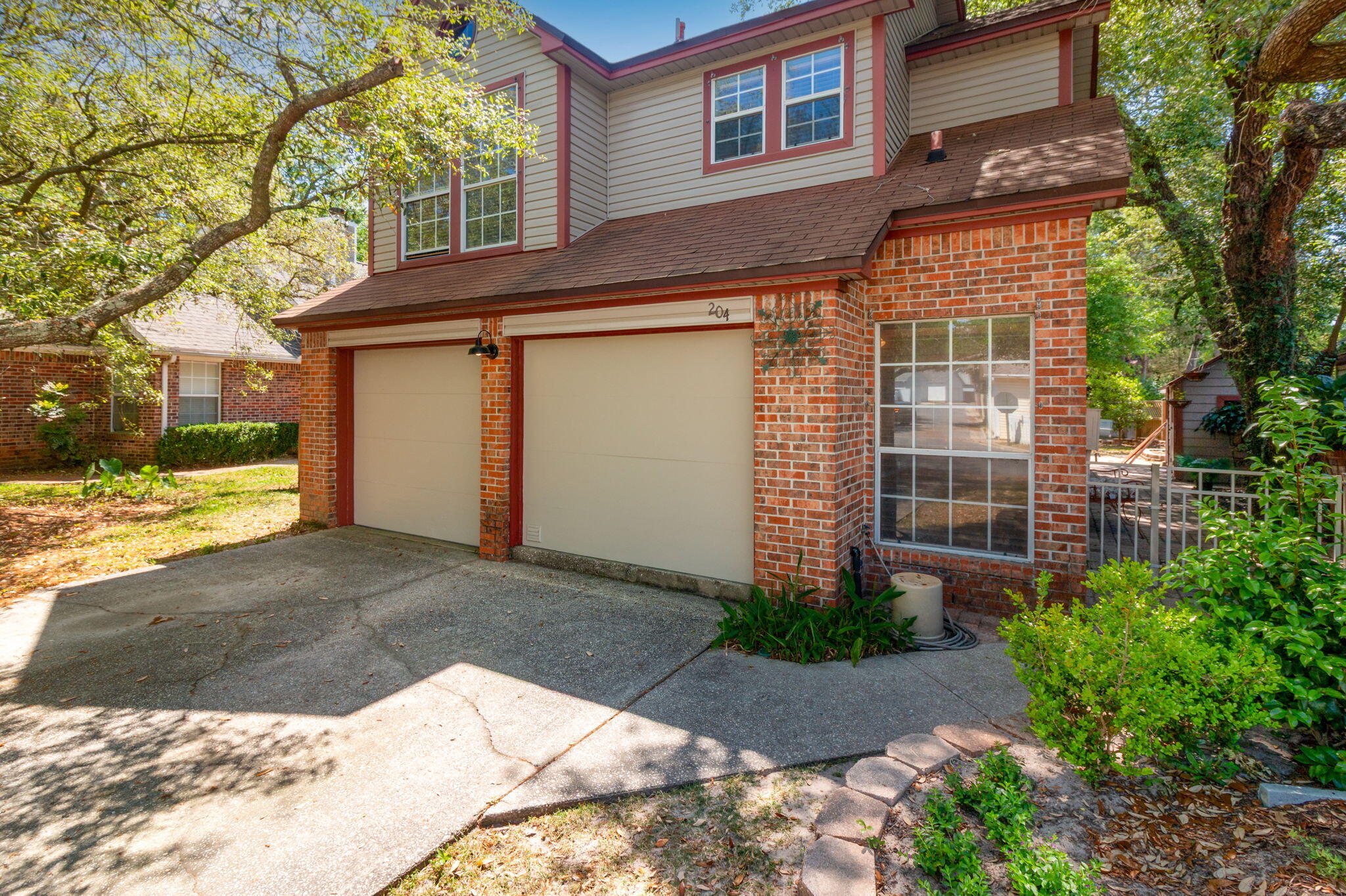 Charming two-story home located in the highly desirable Bluewater Bay community. This updated property features a renovated kitchen, fresh paint throughout, and tile and wood laminate flooring, offering both style and durability. The layout provides comfortable living with plenty of natural light and functional space. Enjoy the privacy of a fully fenced yard, perfect for relaxing or entertaining. Situated in a well-established neighborhood with convenient access to nearby amenities, this home is move-in ready and full of character.