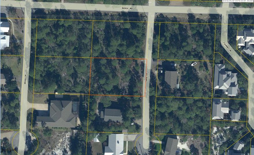 .34 Acre vacant lot partially cleared and ready for your new home. No HOA fees, No Build out time, Not in a flood zone. No wetlands. Close to county beach access and Gulf Place shopping and restaurants. This lot is nestled high and dry in the Santa Rosa Ridge Subdivision. Close enough to take your golf cart to the beach or to have dinner at Gulf Place. Survey on file.