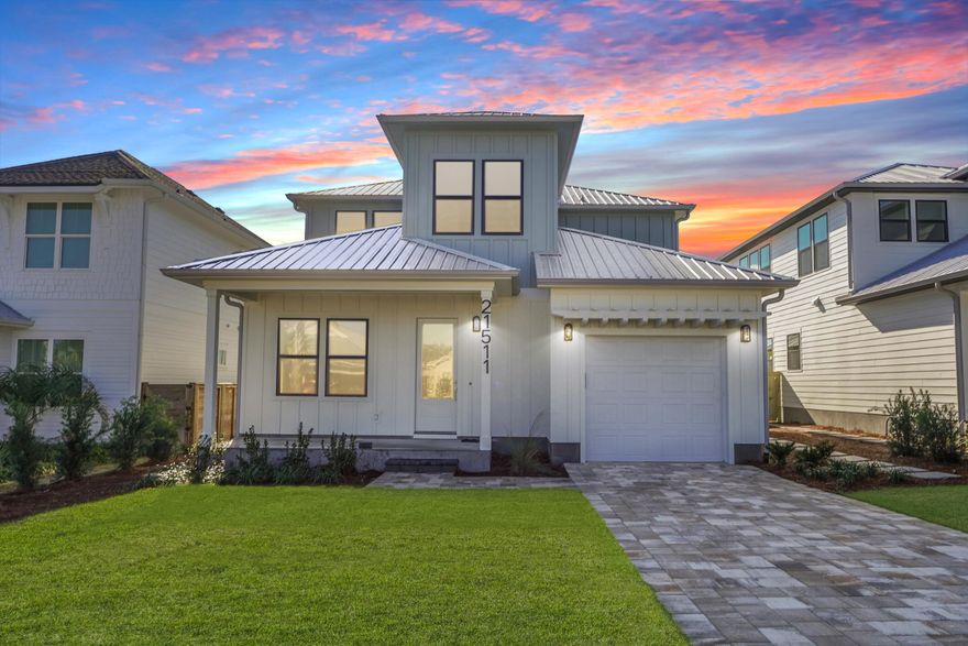Welcome to your coastal retreat! This stunning 2025 new construction home blends luxury, durability, and style, just a short walk from the world-famous white sandy beaches. Offering 4 bedrooms, 3 full baths, and a half bath, this thoughtfully designed property features two bedrooms on the first floor with private en suite baths, making it ideal for family, guests, or rental versatility. Inside, enjoy the warmth of cypress and pine accent ceilings, expansive LVP flooring, and a light-filled loft area perfect for extra living space. The spa-like primary bathroom creates a true retreat, while the custom cabinetry with quartz countertops, gas stove with custom hood, and open-concept kitchen elevate everyday living. Step outside to your private paradise with a saltwater pool and covered back patio, perfect for entertaining year-round. Built with quality in mind, this home showcases 2x6 framing and a durable metal roof for peace of mind. Located in a golf cart-friendly neighborhood, this property allows short-term rentals, making it an incredible investment opportunity. Explore nearby favorites like Dolly Parton's Pirate Voyage, Top Golf, Pier Park, 30A dining and shopping, and Camp Helen State Parkall just minutes away. Whether you're looking for a full-time residence, vacation home, or income-producing rental, this property is the perfect blend of luxury and lifestyle. Estimated completion date 11/1/25.