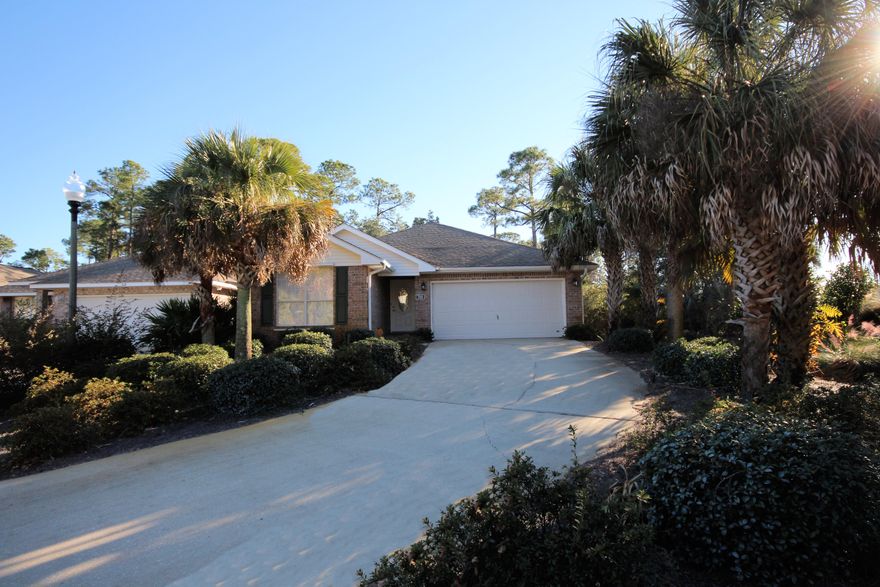 Marsh Harbor, a waterfront community and minutes from Hurlburt, features underground utilities, undisturbed nature areas and water views. The contemporary split floorplan provides space so everyone can enjoy quiet and privacy. Vaulted ceilings and plant ledges in the Living area add a nice touch. Engineered flooring throughout (good for the allergy prone and easy Florida living). The master bath enjoys double vanity and double shower with glass enclosure. Indoor laundry room for convenience (washer-dryer convey, as is). Outside the kitchen is a 13x11 screened deck (trek deck) with remote controlled awning-- the screened area is 34x12. This is a perfect spot to have morning coffee, read the paper, watch the birds. This area looks out to the protected wetlands. Owner was a flower and plant lover so yard is beautifully landscaped. A short walk on the community boardwalk provides access to Santa Rosa Sound. HVAC was replaced (both inside and outside units) in 2014. Seller has a termite bond and a sentracon baiting system. Security system in place but will need to enter into a contract for monitoring. Hurricane storm panels provided.  Marsh Harbor is a deeded waterfront subdivision with walkway access to Santa Rosa Sound. Limited home warranty (Old Republic) provided for buyers' peace of mind.