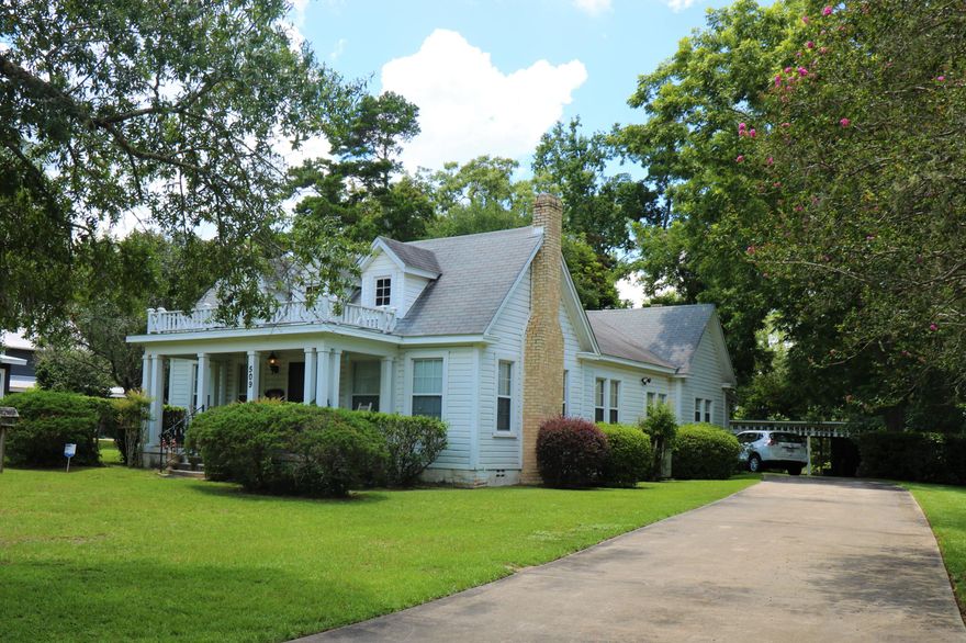Southern Charmer! This beautiful southern style home has been updated and is move in ready. Features include: updated electrical, sprayed insulation and newer windows, gas fireplace in living room, formal dining room with french doors to the living room, and breakfast area and pantry in kitchen. BONUS: 26x7 sunroom off kitchen. Back yard has tons of parking with 6 carport spaces, storage area, long paved driveway and large parking pad area. One acre lot goes from street to street - it fronts S Depot ST in the front and McGee RD in the back.