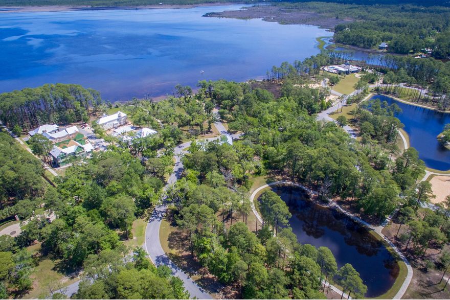 Spectacular park-side home site with bay and lake views in Churchill Oaks, south Walton's newest and most exclusive community. Situated on a spectacular property with over a mile of waterfront, the community's refined sophisticated architecture blends perfectly with existing vegetation and accentuates the style and grandeur of the south. All homes are required to be custom designed and custom built using the finest new and reclaimed materials and craftsmanship. Churchill Oaks exudes charm, taste, and Southern spirit; the perfect place for families to gather, interact, and call home. Call or visit Churchill Oaks today for more information!