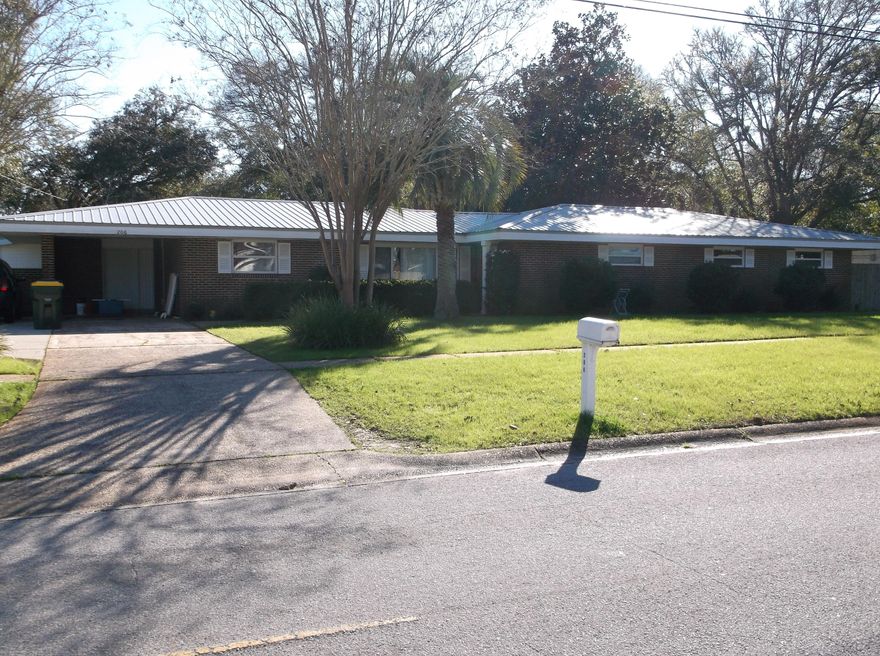 RECENTLY RENOVATED HOME ON LARGE CORNER LOT. DOUBLE GATE ON SIDE STREET MAKES STORING BOAT OR OTHER PLAY TOYS IN BACKYARD EASY. SIDEWALK LINED STREETS FOR A STROLL OR KIDS CAN WALK 1 BLOCK TO CITY PARK. 4 NICE SIZED BEDROOMS, LIVING ROOM AND A DEN, FORMAL DINING ROOM. KITCHEN, DEN AND BATHROOMS HAVE 18' TILE FLOORING. KITCHEN HAS STAINLESS STEELE APPLIANCES AND UPDATED CABINETRY, GRANITE COUNTERTOPS. DEN HAS WOOD BURNING FIREPLACE AND COULD BE USED AS AN OFFICE IF YOU NEED ALL 4 BEDROOMS AS BEDROOMS. HIS & HER CEDAR LINED CLOSETS IN MASTER BEDROOM. HARDWOOD FLOORS IN LIVING ROOM, DINING ROOM, MASTER BEDROOM & 2 OTHER BR'S. BACKYARD IS BIG ENOUGH FOR A POOL & HAS A AREA W/CHAINLINK FENCED OFF AS A PET AREA. EXTRA STORAGE OFF CARPORT. YARD BUILDING ALSO. ALL BEDROOM CLOSETS ARE CEDAR LINED.