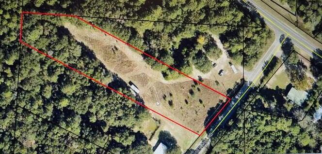 Great location in Baker; this 1.98 acre lot is partially cleared as it used to be farmland to the lot next door. Flood zone X. This could be a Builder's delight or a great retreat but still close to town as it is easily accessible from Hwy 4. Power available from next lot. Buy this lot and the next one! As Will Rogers would say, ''Don't wait to buy Land. BUY LAND AND WAIT.