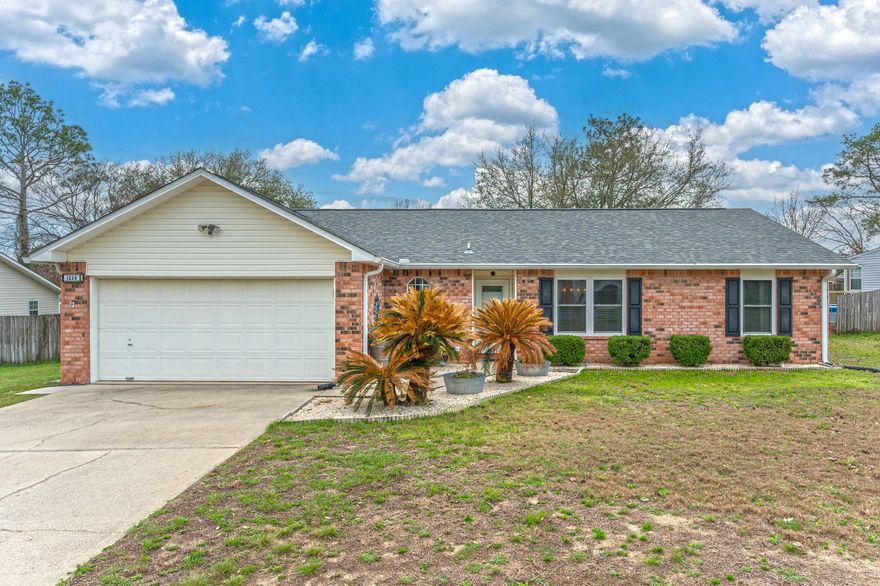 LOCATION, LOCATION, LOCATION... Bases-Schools-Shopping-medical...SO convenient South of I-10, 3 BR makes life simpler! Fresh & Bright split floor plan! Tile in kitchen, eat-in dining area & laundry room. Living area has cathedral ceilings w/French doors leading to screened in Florida room. Primary bedroom offers walk-in closet, Primary bathroom with double vanity and garden tub. Backyard has patio for sunbathing, BBQ's and gardening in the surrounding flower beds.  Recent updates include roof, HVAC, Whole-house Gutters, Septic  leach field, Water heater, Hurricane windows & Front storm door, all super helpful for Ins purposes.  See this one first!