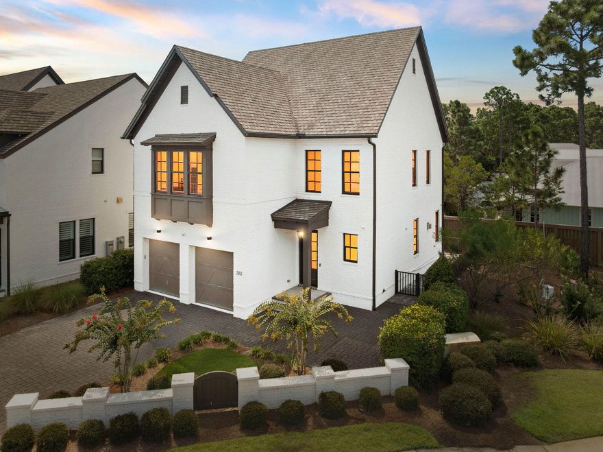 Priced to Sell in RidgeWalk!  Welcome to 202 RidgeWalk, a stunning corner-lot home in the highly sought-after gated community of RidgeWalk, just a short stroll to the sugar-white sands of 30A, Gulf Place dining, and boutique shopping. This non-rental property offers exceptional privacy with a fenced yard, perfect for your furry friends, and low-maintenance turf along the side of the home.Inside, the open and bright living space is designed for both comfort and entertaining. The living room features wood beams and a cozy fireplace with a white brick surround. The chef's kitchen boasts quartz countertops, an apron-front sink, gas cooktop, spacious island, and a convenient dry bar with abundant storage and beverage fridge. An office nook on the first floor provides the perfect space to work from home. Double glass doors open to the back yard, ideal for grilling or dining al fresco.
Upstairs, the expansive primary suite is a true retreat with room for a cozy sitting area, a custom walk-in closet, and a luxurious bath featuring dual vanities, a soaking tub with decorative tile wall, and a separate shower. The 2 additional guest suites share a Jack-and-Jill bath with double sinks.
The coveted two-car garage with epoxy floors adds functionality and style.  With plenty of room to also park in the driveway. 
This move-in-ready home blends thoughtful details with a prime location near the beachdon't miss your chance to make it yours!
