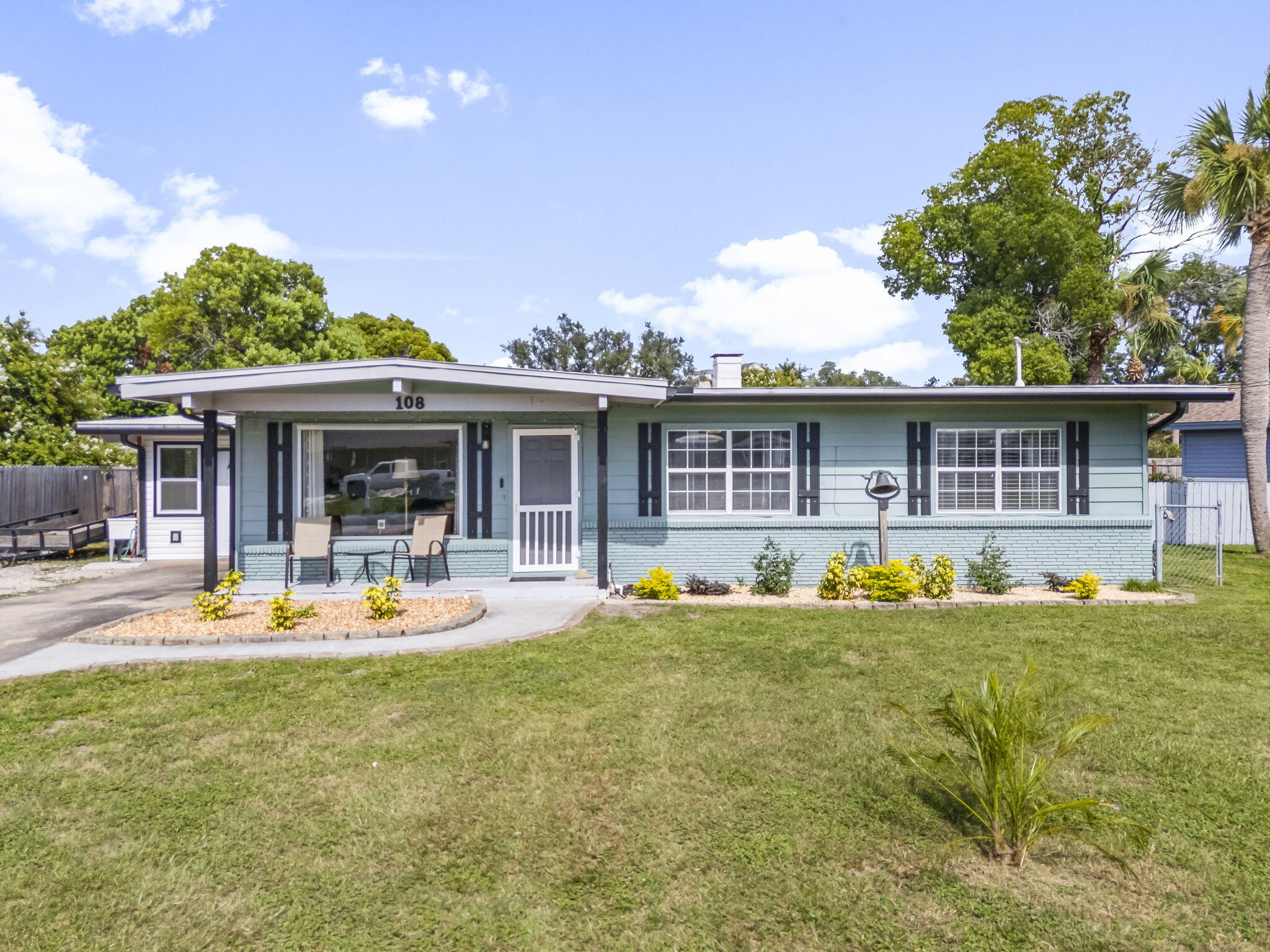 Welcome to 108 Woodlawn Dr, Panama City Beach, a charming single-family home nestled in the heart of the desirable Woodlawn community! This beautifully maintained property offers the perfect blend of comfort and convenience, just minutes from the sugar-white sands of Panama City Beach. Step inside to discover a spacious living area filled with natural light, ideal for entertaining family and friends. Enjoy relaxing evenings in your private backyard oasis completed with an above ground pool and outdoor shower. Plenty of room for all your projects in the large workshop/garage.This home is ideally situated near top local attractions, amenities, and a boat ramp. Short Term Rentals Allowed.