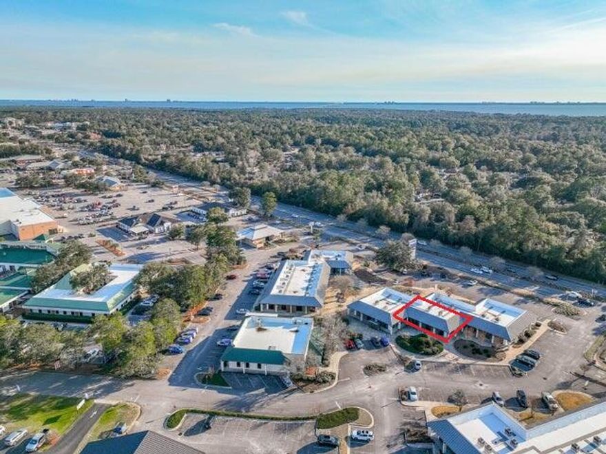 HIGH VISIBILITY & EASY ACCESSIBILITY.  Prime CLASS A office space in popular Merchant's Walk business complex in the  heart of Bluewater Bay. Located in one of the busiest & most popular complexes in BWB, this 1500 SF commercial space is located directly on Hwy 20. Offering 32strategically placed entrances: 1 in the front & 1 on right side, this commercial space offers opportunity for one large business or the subdivision & accommodation of several businesses.  The current floor plan consists of a reception area, 5 offices, 3 flex space areas & 2 bathrooms. Newer roof & HVAC provide peace of mind.