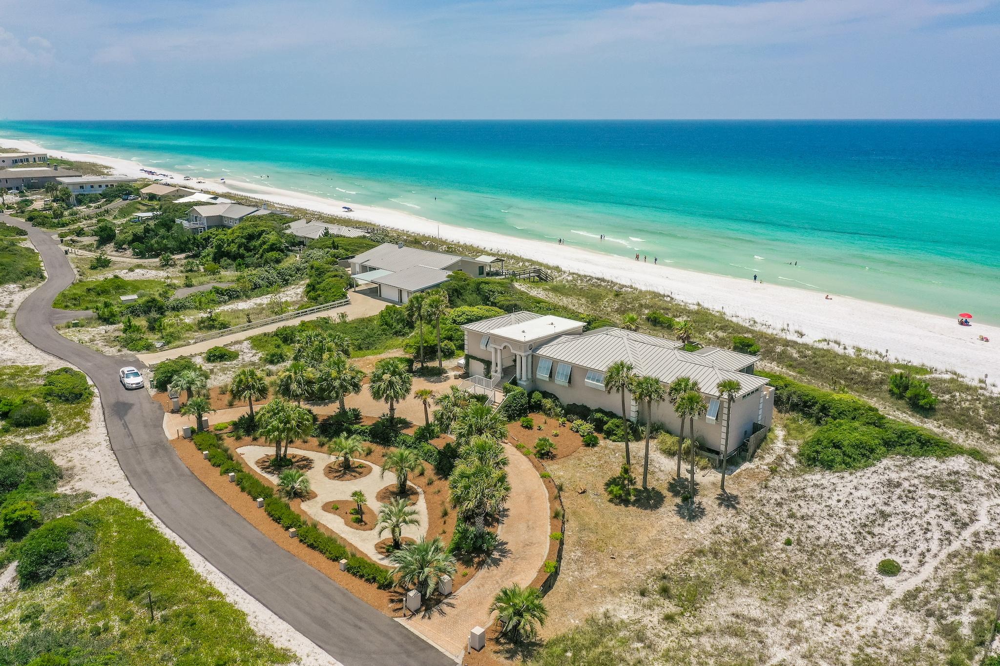 Experience an unparalleled amount of gulf frontage with this gorgeous property, boasting an unheard of 265 feet on the Gulf of Mexico. This is one of the largest privately owned Gulf-front parcels in Walton County. Enjoy panoramic views of the Emerald Coast from almost every room. Take the elevator from the garage up to the main level, where every room is on one floor. Situated on over an acre and a half, the open floorplan of this home allows for expansion, or start from scratch and build to suit on this amazing lot. Located within the enchanting gated community of Four Mile Village, boasting miles of walking trails, access to a 50 acre coastal dune lake and 2,200 fee of private beach access. This home has been very well maintained and cared for. The exterior of the home was resealed and painted in 2016, and the roof was also replaced that year. Other exterior upgrades include Lexan hurricane shutters, 3M UV protective glass and a positive Ion system for lightening diffusing. 