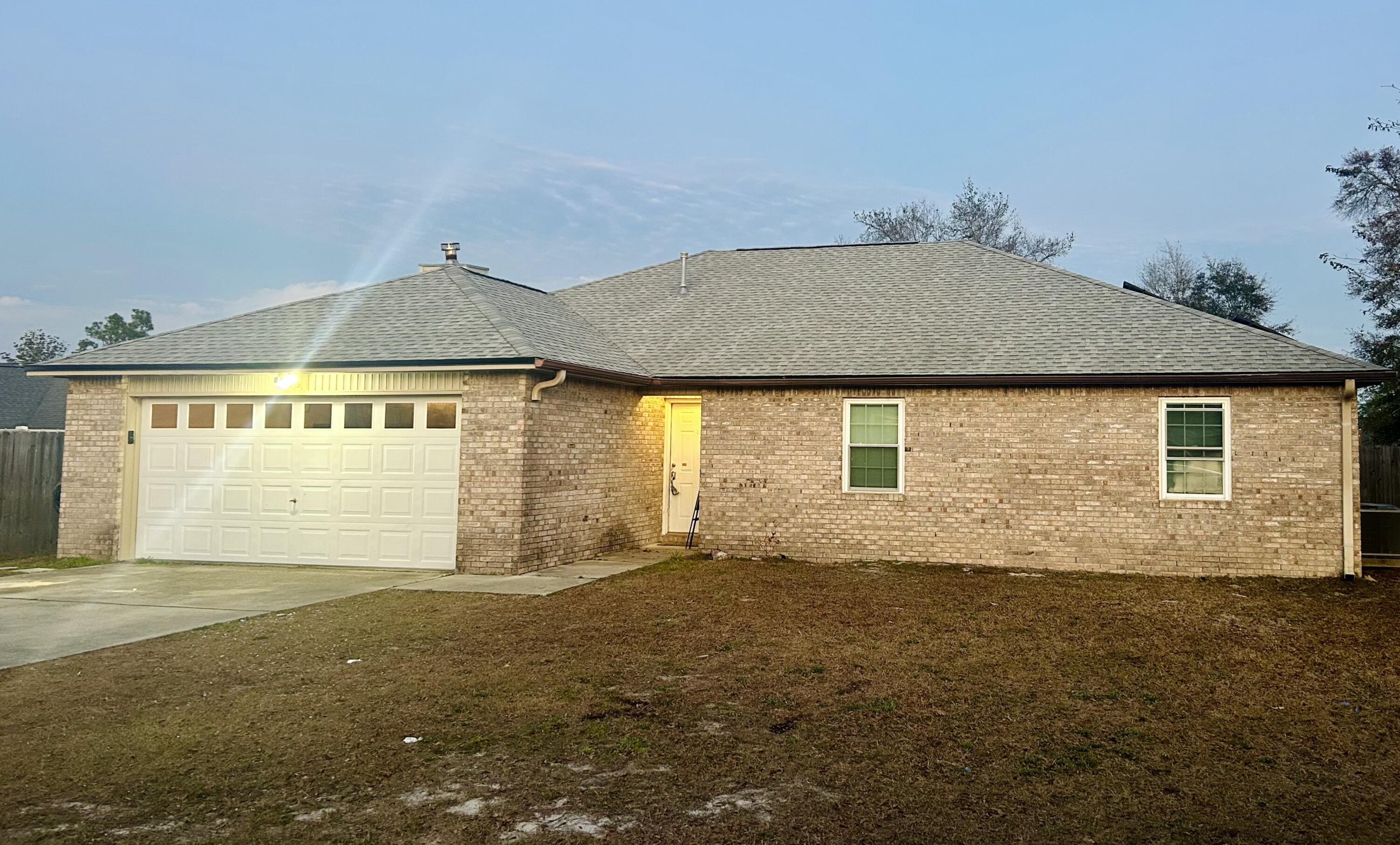 Spacious 3 bedroom, 2 bath brick home, with solar panels, located in Shadow Bay subdivision, only minutes from Tyndall Air Force Base. Completely remodeled, including kitchen, roof, HVAC, and hot water heater in 2019. The floor plan includes an kitchen with large dining room and pantry, living room with trey ceiling and beautiful wood-burning fireplace and French doors leading out to one of the larger fenced backyards in the neighborhood. The master bedroom features a nice walk-in closet and attached bath with double vanities. This home has many updates. Schedule a showing to see this centrally located home in a peaceful neighborhood