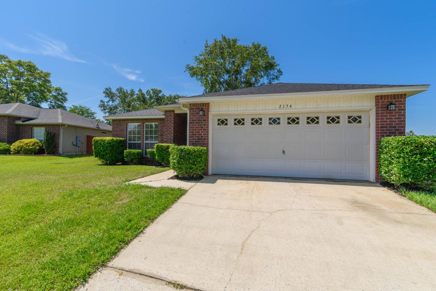 Nestled in the community of Glenview, this home offers large bedrooms and a spacious open floor plan. You'll enjoy the BRAND NEW ROOF and new luxury vinyl plank flooring throughout the entire house as well as fresh paint and a BRAND NEW appliance suite! The kitchen comes equipped with a breakfast bar providing seating for 6 to 8 people, abundant cabinet storage and countertops space, pantry, garbage disposal, built-in microwave, electric cooktop, dishwasher and fridge with ice and water dispenser. The open floor plan with vaulted ceilings makes for a great open spacious feel that offers a nice flow into the dining area suitable for a table that provides seating for 6. Just off the dining area is the primary bedroom and bathroom. The bathroom has a jetted tub with separate walk-in shower, d