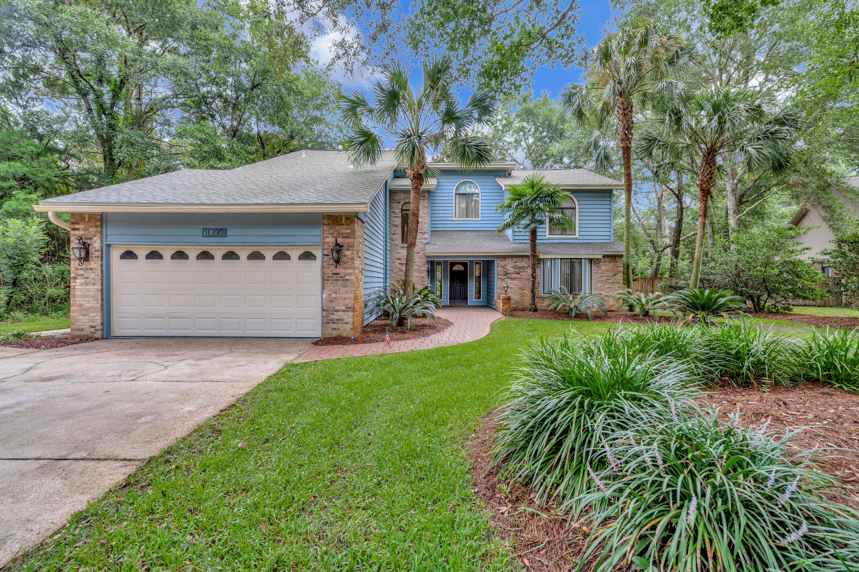 New roof and new smooth ceilings! Updated 4 BR/3 BA home w/ office & loft located in gated Windward Community. Don't miss the private community beach with a fishing pier, swim docks, and tables on a white sandy beach for residents & their guests. Hard-to-find 0.5 acre lot with tons of backyard space--enjoy outdoor living with oversized decking, pergola, porch swing, and a 6' privacy fence. Eat-In Kitchen features a Wolf Oven, Cooktop and pop-up vent. Walk-in pantry is perfect for households of all sizes. Large family room with cathedral ceilings is in the center of the home with 2 bedrooms and full bathroom on one side and kitchen, laundry, dining room and sunroom on the other side.