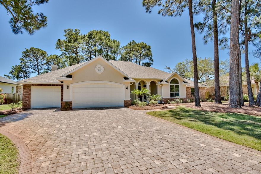 Gorgeous, move-in ready home on highly sought after Indian Trail. Everything has been updated in this 4 bdrm home. Perfect for entertaining, you'll find 2 living rooms, dining room & heated & cooled Florida room with high impact glass. Three car garage, paver driveway and sidewalk plus a private fenced in backyard w/room for a pool! Easy living, one story home with central vac system. One year old roof, brand new 5 ton HVAC with gas heat, new gas water heater, new paint interior & exterior and new lighting! Kitchen features new granite w/stainless appliances, built in desk & gas fireplace. New flooring throughout-NO CARPET! This home has it all plus it's located in the heart of Destin! HOA dues are voluntary at $75 per year!