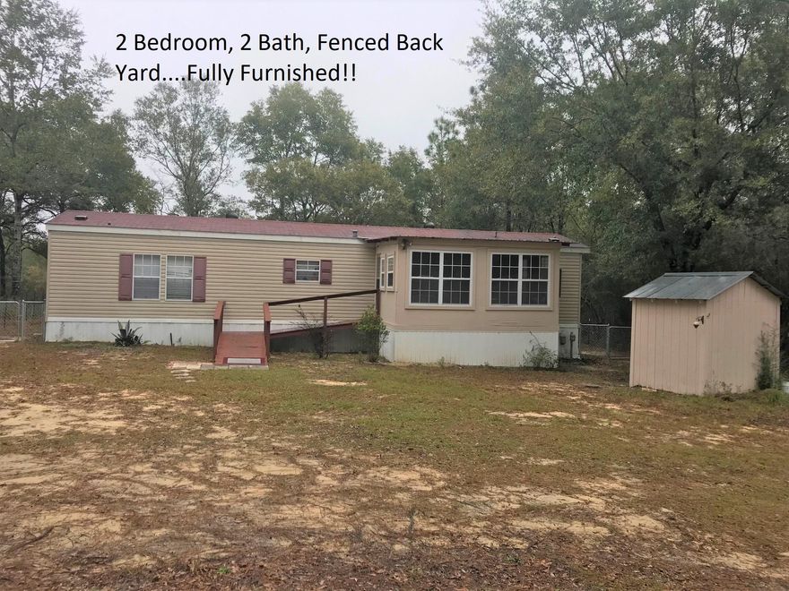 Great buy on this 2 bedroom, 2 bath 2006 single-wide manufactured home just 5 minutes outside of town. This home comes fully furnished PLUS all appliances (washer, dryer, refrigerator, microwave, stove, dishwasher)! Just move right in, or would make a great rental! Open floor plan; 1 BR, 1 bath at each end of home, New HVAC installed Oct. 2018; 12x16 enclosed porch; fenced back yard and storage shed with power in back yard. Home is on well and septic. Schedule your showing today!