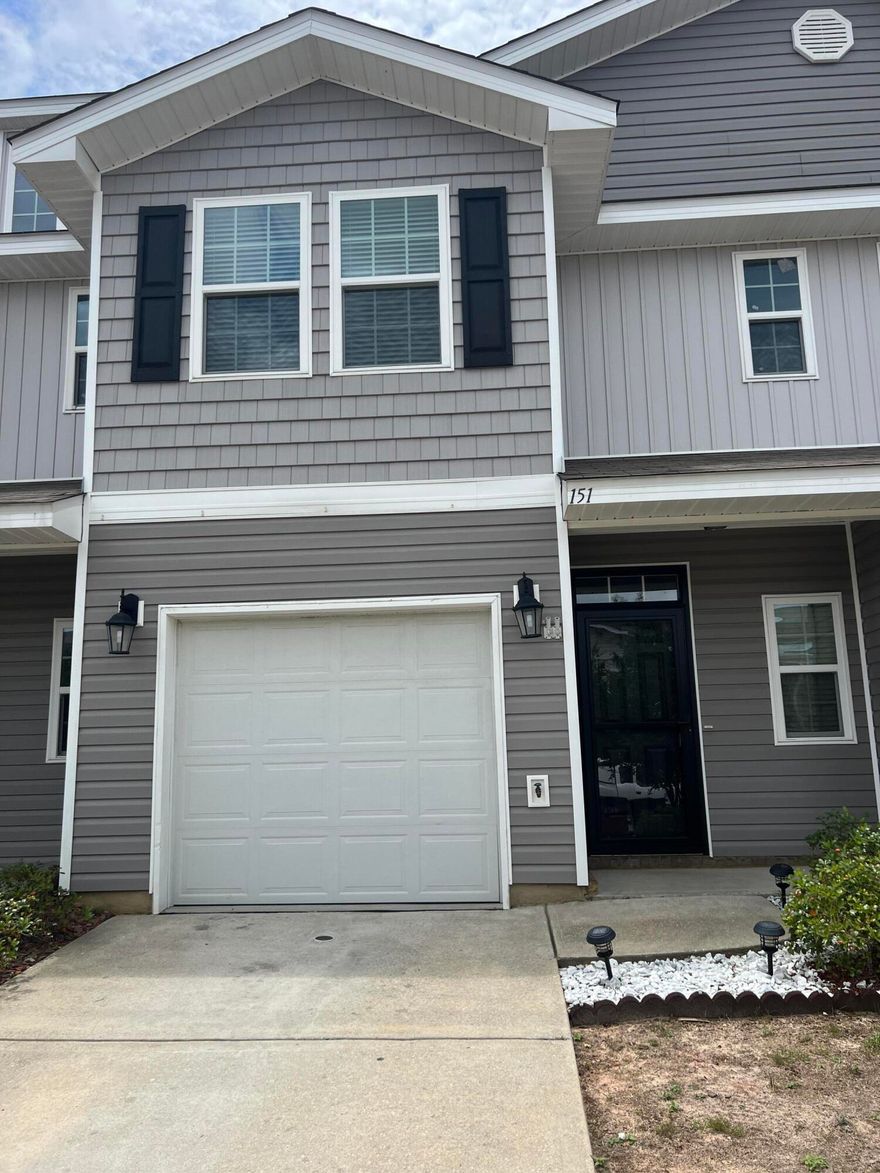 Available Now.....Easy access to bases, beaches and shopping.  Located in the heart of Crestview, great 3/2.5 townhome with affordability.  Vinyl barn wood plank flooring in the main living areas. Galley kitchen with nice appliances and breakfast bar. Bedrooms are upstairs in this unit with a 1/2 bath downstairs for guests.  This unit has 1 car garage and covered front porch entry.  Spacious rooms and neutral paint.  No inside smoking or vaping.  Pets welcome with homeowner approval and $400 non-refundable pet fee.
