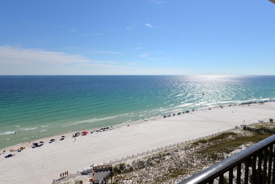 WOW!! 2014 GROSS RENTAL REVENUE WAS OVER $60,000!! ''Relaxed Elegance'' describes this truly gorgeous gulf front two bedroom, two bath condo. One of only two units on the 14th floor of Beachside I allows for quiet privacy. Exquisitely furnished in a neutral palette with the best of the best furnishings. This larger two bedroom floor plan offers balcony access & gulf frontage from the master bedroom as well as the living area. The kitchen features upgraded cabinetry, hard surface counter tops, & a pantry. The master suite has an attractive built-in window seat for extra storage & a place to relax & enjoy the spectacular views from the inside. It also has a luxury bath with a glass block wall & a walk-in closet. Other amenities include travertine marble floors, plantation shutters, a