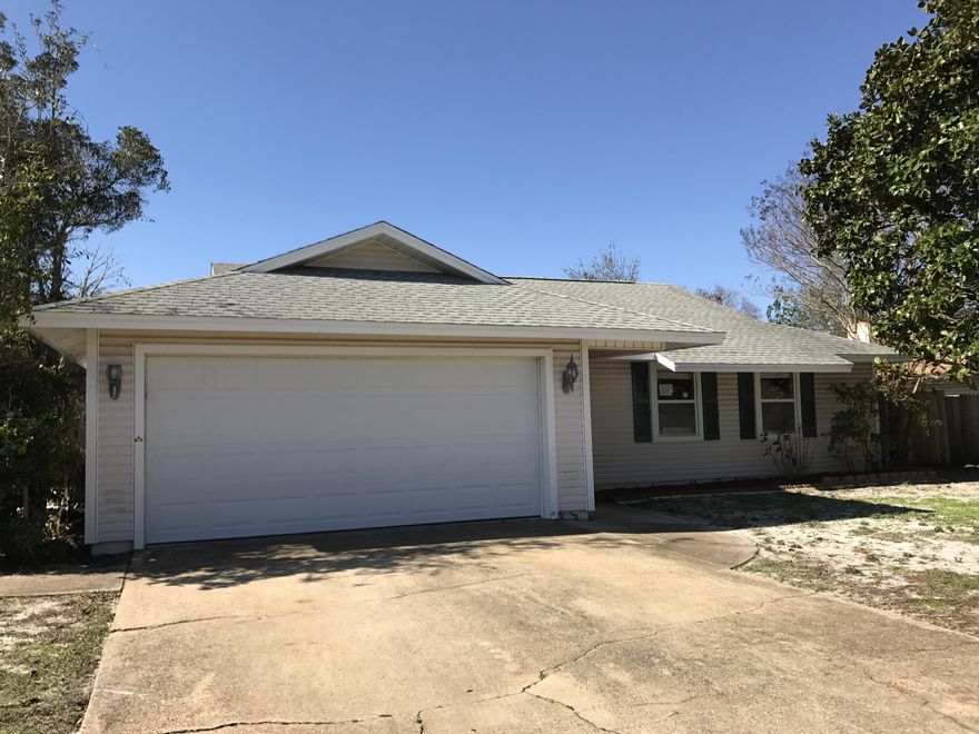REO ~ Move in Ready in the heart of Destin! This 3 Bd / 2 Ba home offers fresh paint through out & new carpet through out the living room, dining room, master bedroom & one guest bedroom. The second guest bedroom offer parquet flooring. The living room features fireplace & large window for lots of natural light. You'll be able to beat the heat this summer in your in-ground pool with new liner!! Don't miss out on all this home has to offer. This is a FannieMae HomePath property.