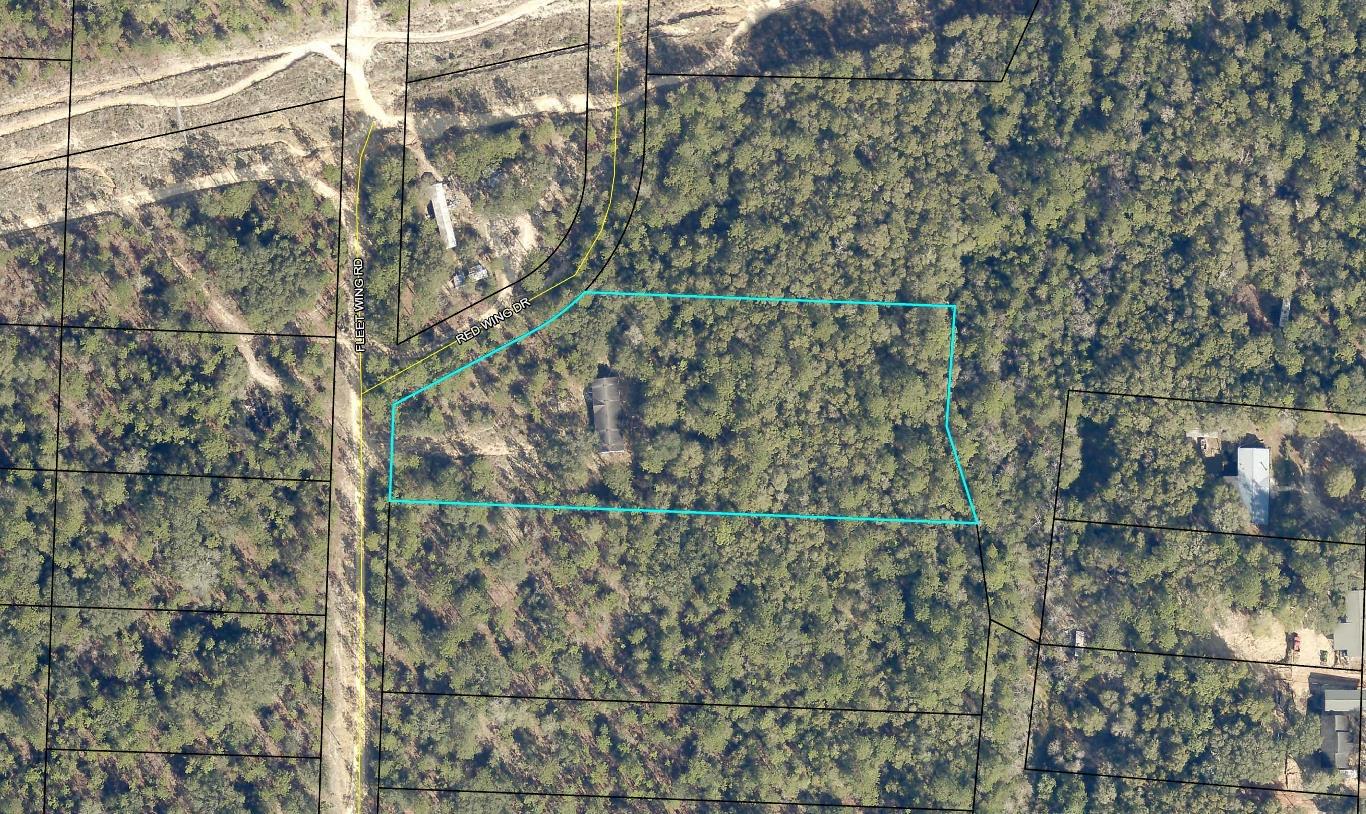 Vacant land close to interstate. Lot has an existing mobile home that we are not giving any value. You will need a 4 wheel drive to get to property.