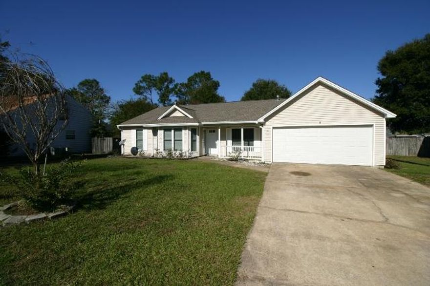 Charming south Crestview home! Close to military bases and easy access to shopping, dining and more. This home features a spacious living room, split bedroom floor plan, formal dining room, Florida room and eat-in-kitchen. There's a 2 car garage and privacy fenced back yard. A little dated, but well taken care of and great potential. Call to see it today!