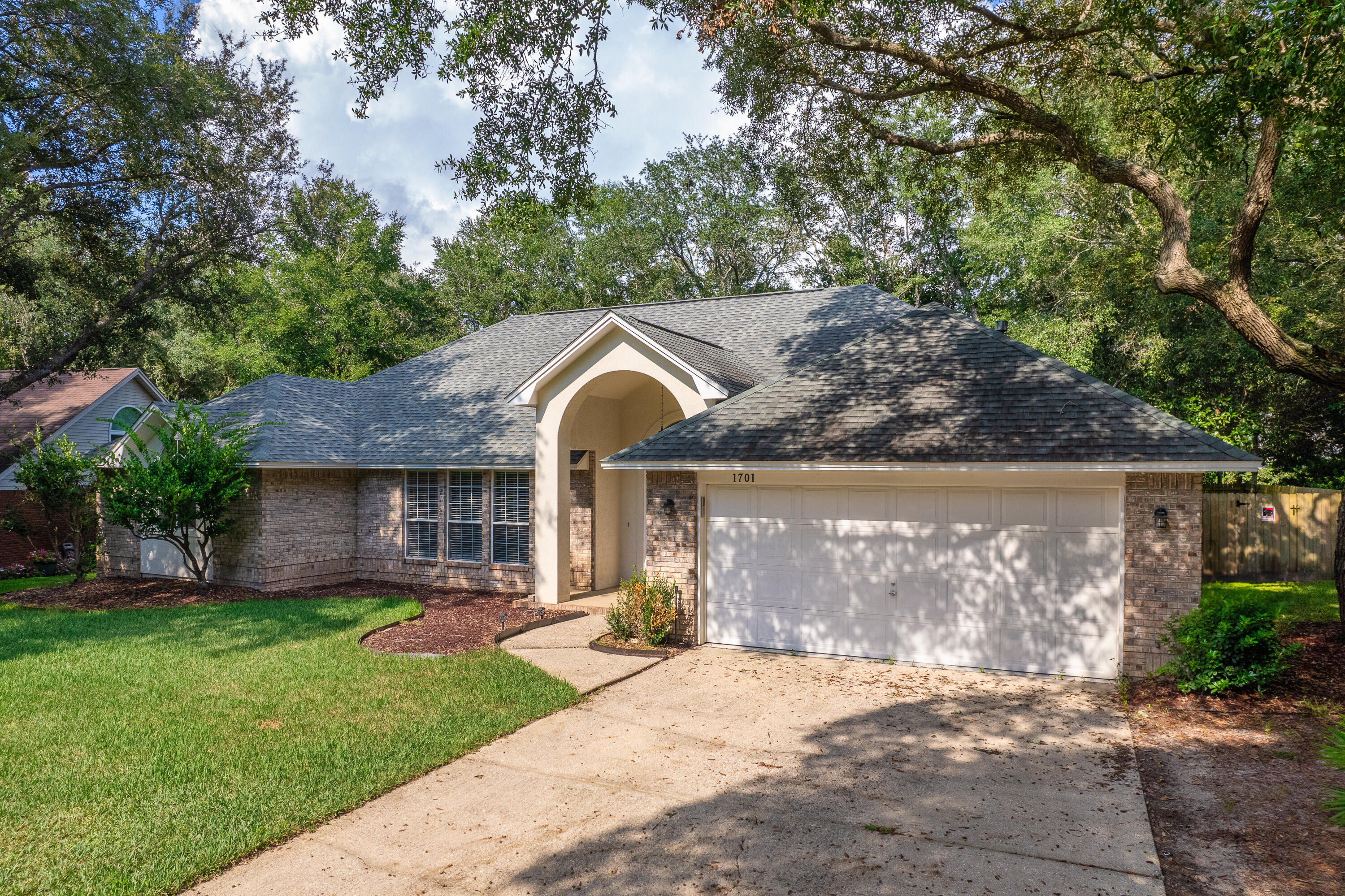 Situated on a quiet cul-de-sac in the gated community of Parkwood Estates, this stunning one-level home offers the perfect blend of comfort and style. Featuring separate living and dining rooms, a cozy fireplace, and an impressive gunite pool with spa and enclosure, this home is designed for both relaxation and entertainment.Beautiful Mohawk hardwood flooring flows throughout, enhancing the home's inviting atmosphere. The thoughtful split-bedroom plan places the master suite on one side, providing ample space for a king-sized bed and a home office. Enjoy direct access to the covered patio and pool from your private retreat. The master bath is a luxurious haven, complete with dual vanities, two walk-in closets, a separate tile shower, and a large whirlpool tub. The bright breakfast room overlooks the pool area, while the additional bedrooms also benefit from abundant natural light, creating a warm and welcoming environment. An oversized garage provides plenty of space for all your toys and projects.
With convenient access to shops and Bluewater Bay Elementaryjust a short bike ride awaythis home is perfect for those who value location and convenience. Don't miss outcall today to schedule your tour!