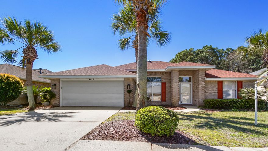 Set in a desirable lakeside neighborhood, this home offers a well-designed and spacious lay-out, perfect for both relaxation and entertainment. The split floor plan provides privacy for the master bedroom, while the remodeled kitchen serves as a central hub with its modern quartz countertops, stainless appliances, and ample pantry space. With an open connection to the living area, you can enjoy the peaceful lake views and natural light pouring in from the vaulted ceilings and skylight domes. The gas fireplace adds warmth in the colder months, complementing the serene setting. The formal dining room, with its high ceilings and elegant columns, creates a distinguished space for gatherings. The master suite is a retreat with its large bathroom featuring quartz countertops, a walk-in shower,