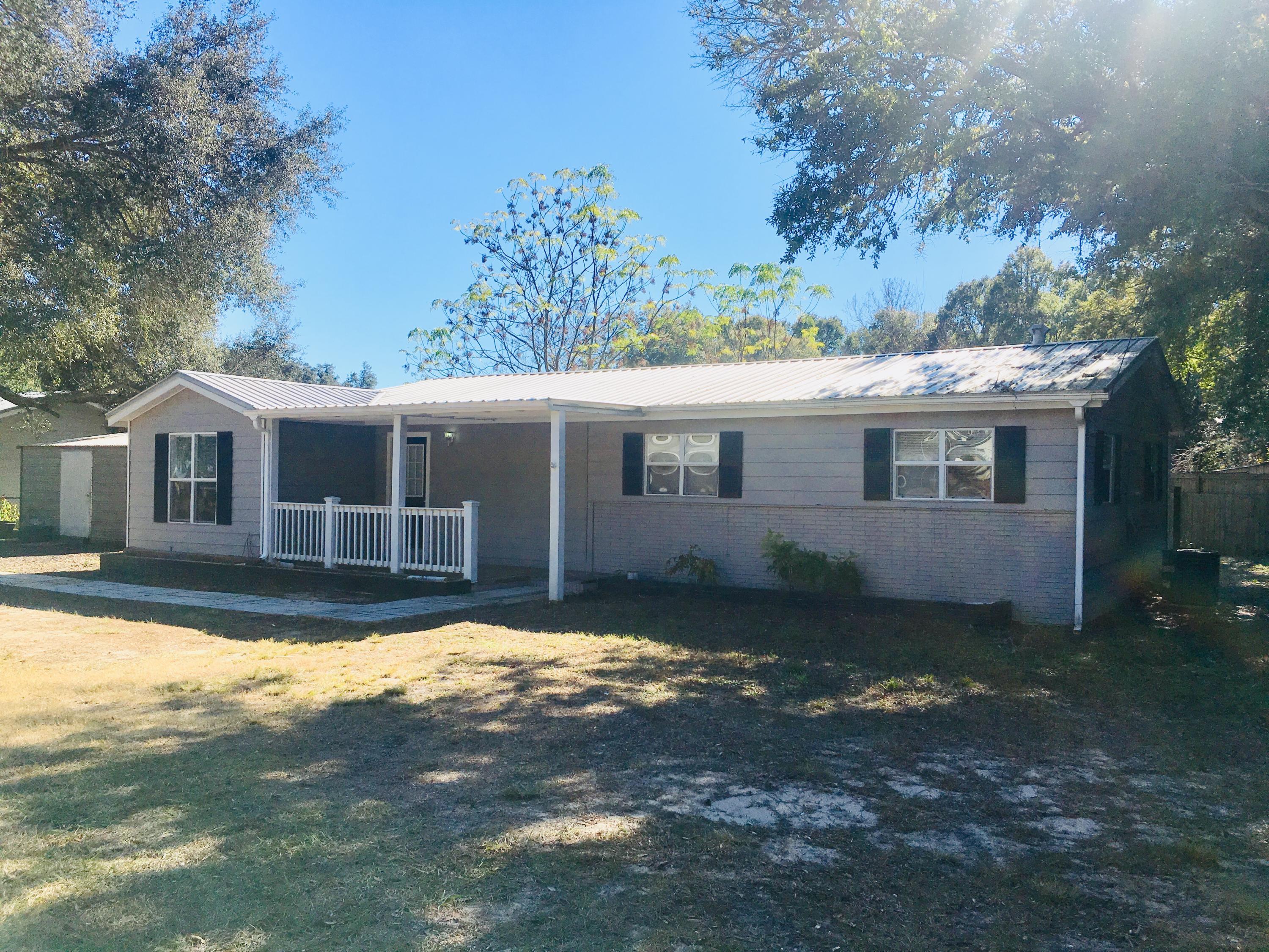 Newly renovated 1,400 sq ft 3br/2ba home located in the heart of Niceville, features new paint, vinyl floors, and stainless steel kitchen appliances. The entryway leads directly into the living room and adjoining kitchen. The living room also serves as the central point for this split floor plan; on the left side is the oversized master bedroom with bathroom, and to the right are the two additional bedrooms and second bathroom. In addition to the new stainless steel appliances, the kitchen is furnished with tile flooring and white cabinets.Exiting from the kitchen you will be greeted by a wood covered deck overlooking a spacious and fenced backyard, complete with a work shed with electricity. Its ideal location places this home very close to schools, work, and local amenities such as;