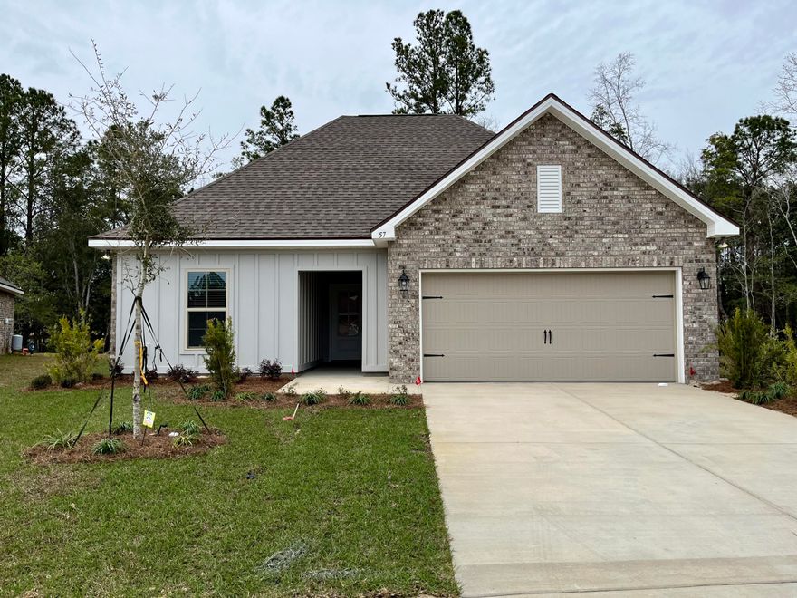 The NOLANA IV G in Moonswept at Hammock Bay community offers a 3 bedroom, 2 full bathroom, open design.  Upgrades added (list attached).  Features: double vanity, garden tub, separate custom tiled shower with frameless door, and walk-in closet in the master suite, covered front porch and rear patio, recessed lighting, crown molding, kitchen island, walk-in pantry, undermount sinks, framed mirrors, smoke/carbon monoxide detectors, landscaping package, architectural 30-year shingles, flood lights, and more!Energy Efficient Features: water heater, kitchen appliance package, vinyl low E windows, and more!