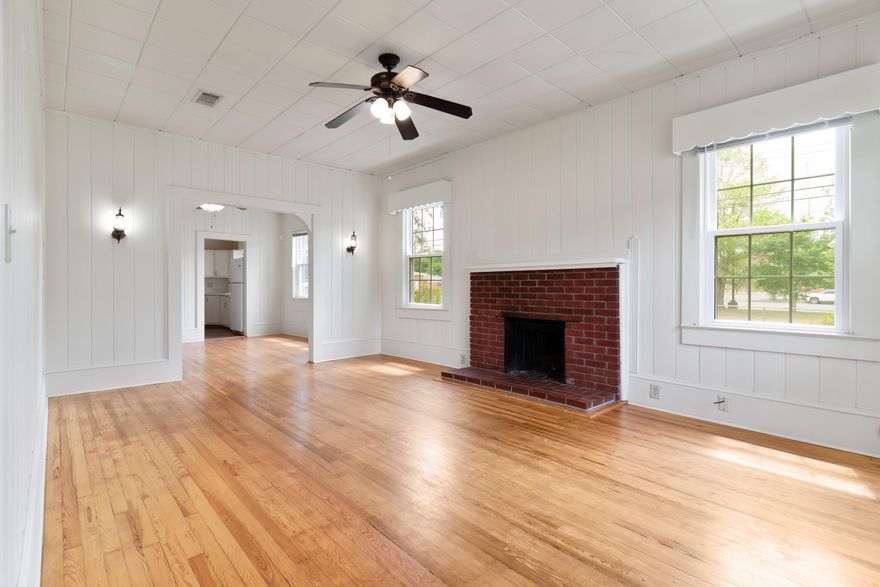 Investors, historians, and city of Crestview fanatics STOP right now! This gorgeous corner lot 1940 build home is screaming character in all the right ways. The mainhouse featuring two large bedrooms and a beautifully renovated bathroom is packed full of hardwood floors. The large family room proudly displays a gorgeous framed brick fireplace and 'midnight' light fixtures. Located in the heart of downtown Crestview just steps from mainstreet, this massive lot is convenient to get to and fro! The seperate unit off the back is a full live-in apartment with a private entryway, all needed appliances, a full bedroom, full bathroom and a living/dining space. Don't miss your opportunity to own a unique piece of Crestview history!
