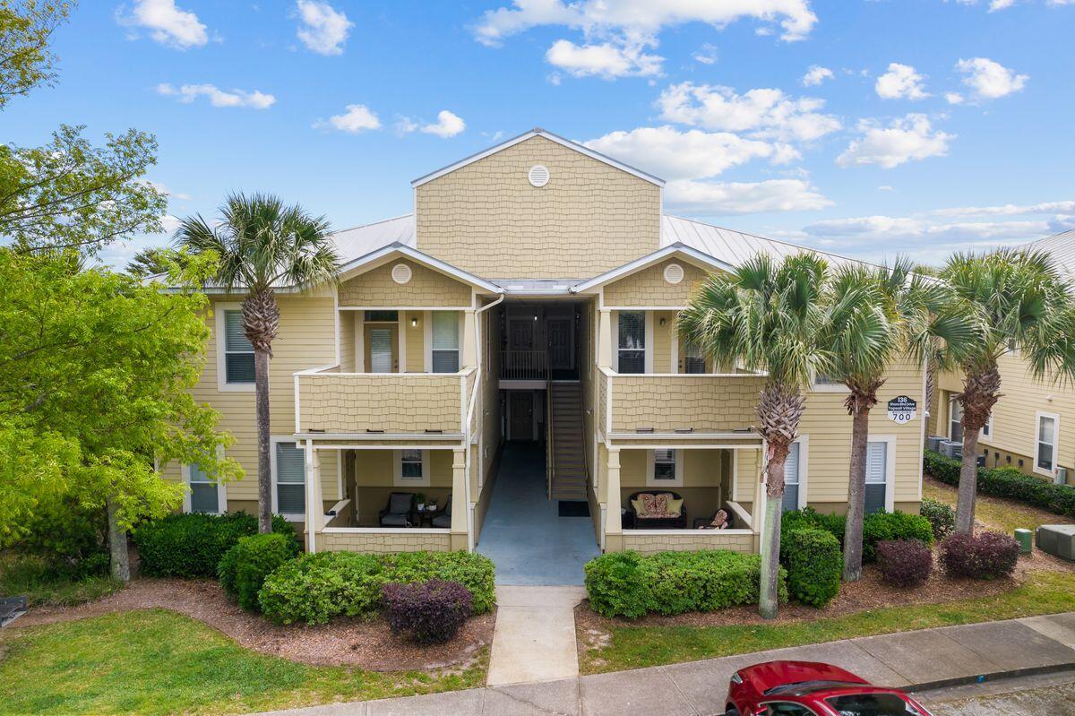 A rare find along 30A, this is the lowest priced two bedroom condo available along the 17 mile stretch of Scenic 30A. Freshly painted as well as a new dishwasher added, you will enjoy this top floor condominium as a primary residence, second home, or vacation rental investment. A local rental company projects $48,000-$65,000 in gross rental income. This condo has beautiful views backing up to the forest preserve. Topsail Village is ideally located across the street from Topsail State Park (1640 acres) and a short stroll or bike ride from the Stallworth and Dune Allen public beach access points as well as all of the shopping and dining that 30A has to offer. Grand Boulevard is also conveniently located nearby where you will enjoy upscale shopping, dining, grocery and the movies!