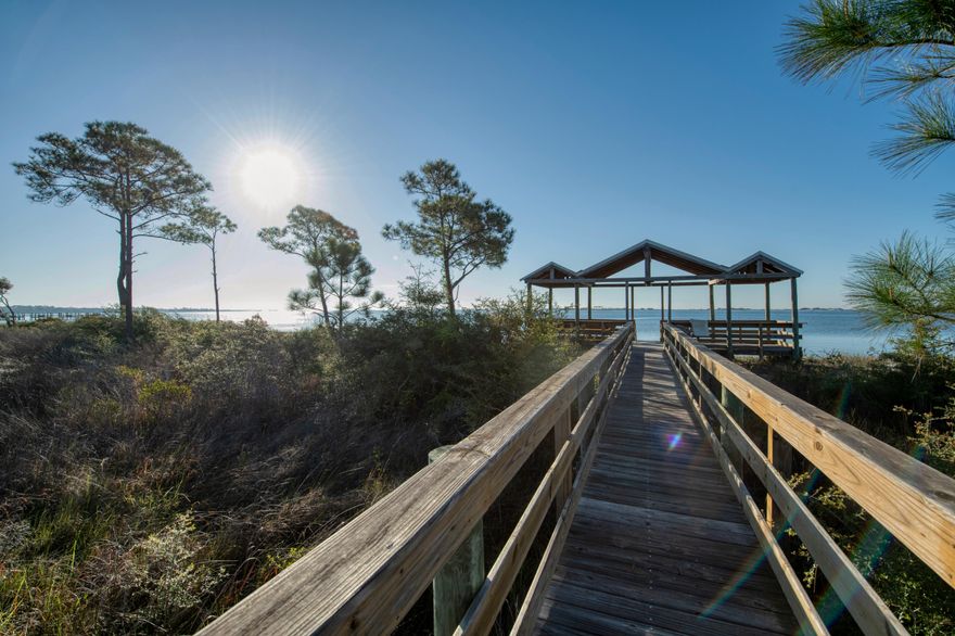 Corner lot home located in a popular neighborhood of East Navarre. Biscayne features deeded water access to the sound side to paddle board, kayak and fish. This home features tall ceilings, newly fenced yard, side entry garage, and many updates inside. The appliances were just installed, and the washer and dryer conveys as well. The smooth ceilings were the finishing touch to the home to give it a modern feel. The property extends beyond the fence on both sides so don't judge by the fence line. The yard is nearly a half acre for great curb appeal and a nature feeling with the abundance of trees left standing. Welcome home!!!