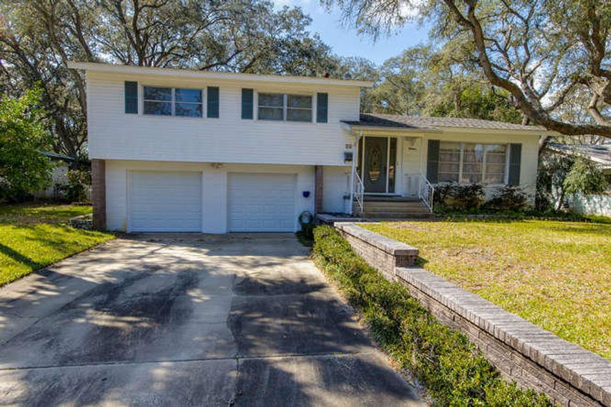 Charming home located in the heart of the most demanded Fort Walton Beach neighborhood--Elliott Point. Original Hardwood floors under carpet in all rooms except kitchen, foyer, and family room. Located on a large Live Oak tree filled lot with a large fenced back yard. Less than 10 minutes from the white sands of the beach. Large Florida room on the back off the family room. Large oversized 2 car garage with laundry & storage. Lawn irrigation system with well and pump. Large family room with gas/wood burning fire place. Master bedroom with en suite with walk in shower. New roof in 2004. Well loved & cared for over the years. Bike to downtown Ft. Walton Beach and enjoy the local shops and restaurants. A few blocks to the neighborhood boat ramp and 1 block to the playground. Don't Wait!