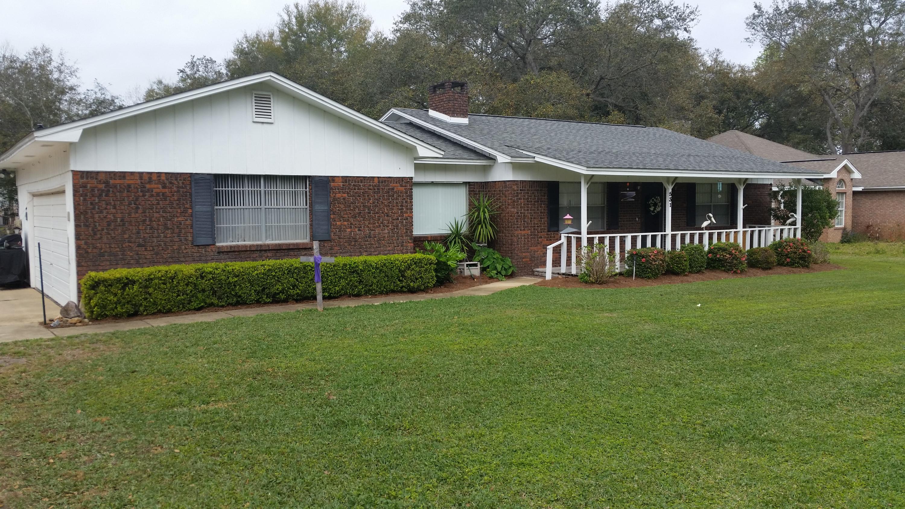 A wonderful traditional floorplan home in the heart of Old Destin sitting on two lots covering almost 1/2 acre with plenty of front yard and a spacious pet friendly fenced-in back yard. Owners have put a lot of love into this 2-bedroom 2-bath home, adding extended utilities in the front and back yards and a 30-amp hookup for an RV. Comes with a fully secure 12x20 enclosed shed wired for power, cable and water to use or store your lawn and other equipment. Rust free well and full yard sprinkler system. Move in ready with a transferable home warranty. One block from Destin Elementary School and two blocks from city boat launch and conservation area. Carpeted living room and bedrooms, tile in kitchen and dining room bathrooms.