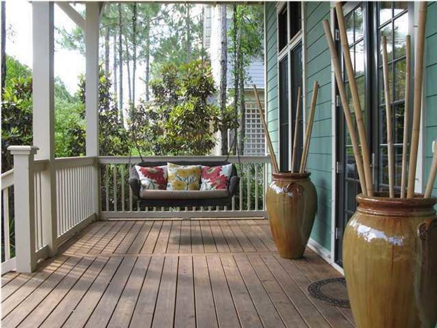 Beautifully maintained 4 bedroom home in Watercolor situated in Phase 2 backing to a nature preserve and short walk from the newly re-designed, family-friendly CAMP WATERCOLOR poolsExterior and interior have been recently painted. The property is currently on the VRBO rental program (#468960) and offers strong rental numbers and history. In addition, the HOA mandatory, quarterly ''special'' assessment for the Beach Club and Camp Watercolor expansion projects has been PAID IN FULL. This fully furnished, beautifully decorated, 4BR home, each with an en suite bathroom, has a wonderful floorplan with two master suites downstairs, wood flooring throughout, high ceilings and a large living and dining area. Additionally, a unique, one-of-a-kind, screened-in back patio room with TV, The rental numbers are in the MLS under documents. They generate over $100,000 a year in gross revenue.  The newly redesigned Camp Watercolor with $4million new features like a lazy River and slides is a 7 minute walk from the house.