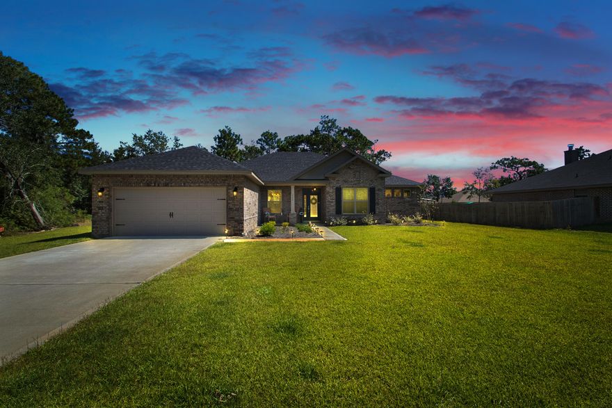 1 year old home, with ALL the upgrades, on a half acre lot, in Holley by the Sea on a cul de sac! Why would you want to build when you can move right in! This outstanding like new home has 4 bedrooms, 3 baths, 2905 square feet of beautiful living space! Tall ceilings, neutral paint colors, wood tile flooring in the main living area! There is an the office, open living room with coffered ceiling and dining area overlooking the chef's kitchen boasting white shaker style cabinetry with soft close drawers, gorgeous granite and an expansive kitchen island highlighted by pendant and can lighting. The dining area overlooks the large half acre back yard with lush green grass - perfect for installing a pool in the future The split floor plan separates the master on one side of the home with the other 3 bedrooms on the other side - a perfect getaway!  All bedrooms are spacious in size and come with large closets, plenty of room for storage. The master bedroom has a soaking tub and walk-in shower, tile flooring and separate walk-in closet. The spacious laundry room comes with an additional refrigerator that will covey with the sale. Rare Holley By the Sea home with public SEWER!  This home is within walking distance to West Navarre Primary School and close to the Holley By the Sea Recreation facility which features a gym, family pool, wading pool and lap pool, clay tennis courts, recreation center, beach access as well as a weight room and youth department.