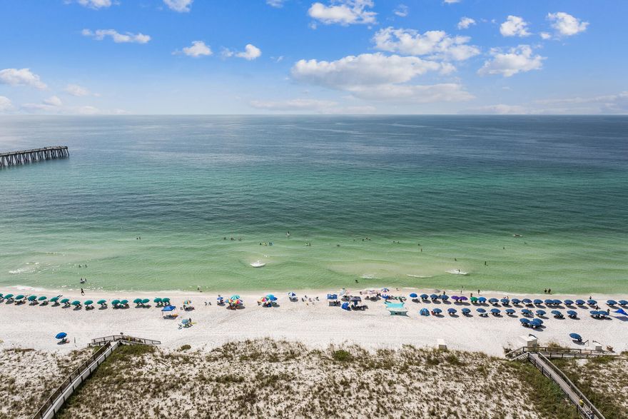 Don't miss out on the Unbelievable Views of the Gulf, Sound & Island!!! This turn key ready impeccable condo is perfect for a beach getaway! Whether you are looking for a 2nd home, vacation rental investment or just simply live in paradise full time, it's perfect! Fully furnished! Just bring your bathing suit & flip flops! Renovated features throughout this amazing high rise condo! Remodeled kitchen includes granite countertops, tile backsplash, glass doors on upper cabinets, wine rack above the refrigerator, stainless steel appliances which includes an additional beverage cooler that will cool down to 26. Along with a formal dining area in the open floorplan, you also have a breakfast nook in the kitchen with large windows on 3 sides with amazing views in each direction!