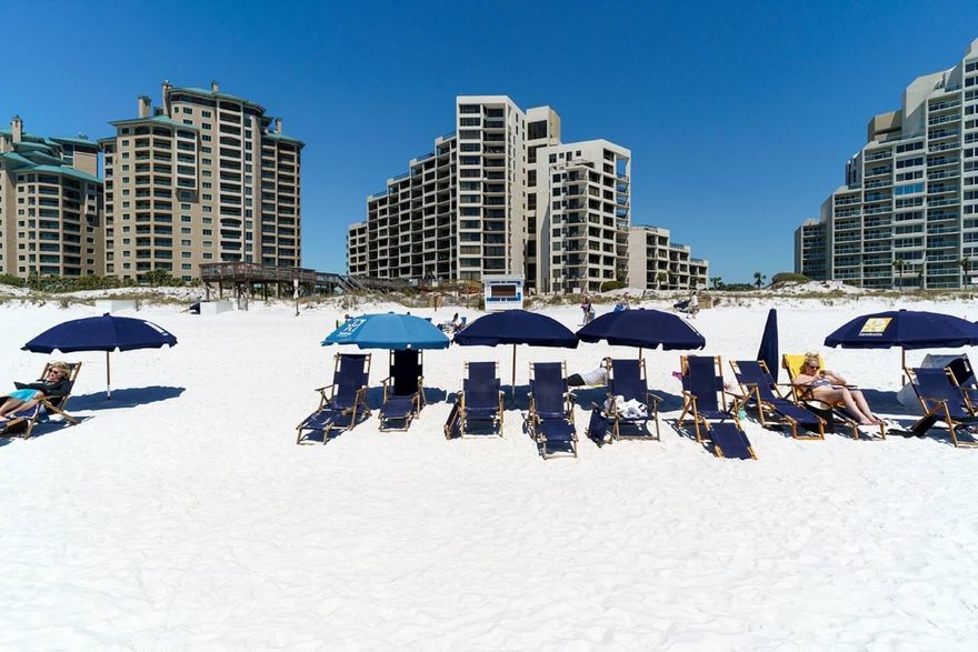 12 MONTH HOME WARRANTY INCLUDED. PRICE REDUCTION!!!! Newly renovated first floor unit at Beachside One. All new furniture, TVs, floor and barn door. New appliances and the HVAC was replaced October 2021. Pet owners can enjoy the walk out to green space and families love the new pool and spa are just steps away.