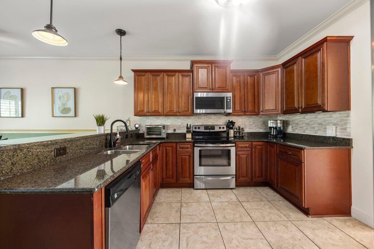 Welcome to this charming 4-bedroom, 2.5-bath townhome on the desirable south side of HWY 98. This two-story home features an open floor plan with the primary suite conveniently located downstairs. Enjoy the elegance of tile flooring throughout the home, 9-foot ceilings, and crown molding that add a touch of sophistication. The modern kitchen boasts a breakfast bar, perfect for casual dining or entertaining. Step outside to the back patio for a breath of fresh air. Just across the street, you'll find the sparkling community pool, ideal for relaxing and socializing. This townhome is part of a small, friendly community with streetlights and sidewalks, offering welcoming environment. Feel the breeze from the Santa Rosa Sound and embrace the coastal living lifestyle. Additional features include a storage shed for extra convenience. Whether you're looking for a great investment property or a full-time home, this townhome offers the perfect blend of comfort and style. Home being sold fully furnished with acceptable offer. Don't miss out on this opportunity. Schedule your showing today!