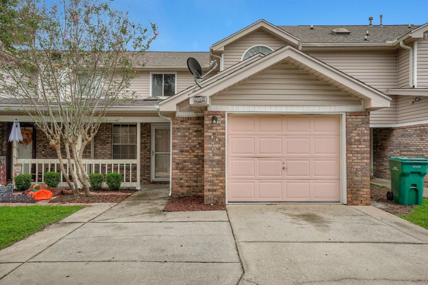 MOVE IN READY! This adorable townhome is in a great location, close to everything. As you walk into the home you are greeted by the titled living area and skylights and eat-in kitchen. The kitchen offers granite counter tops and a breakfast bar. There is a door leading to the quaint back porch that has been privacy fenced. Off of the living area is the master suite which also has doors leading the back porch. Upstairs you have two full sized bedrooms with a shared ''jack-n-jill'' style bathroom. The home is on a private, dead-end street with no through traffic allowing for a safe environment.