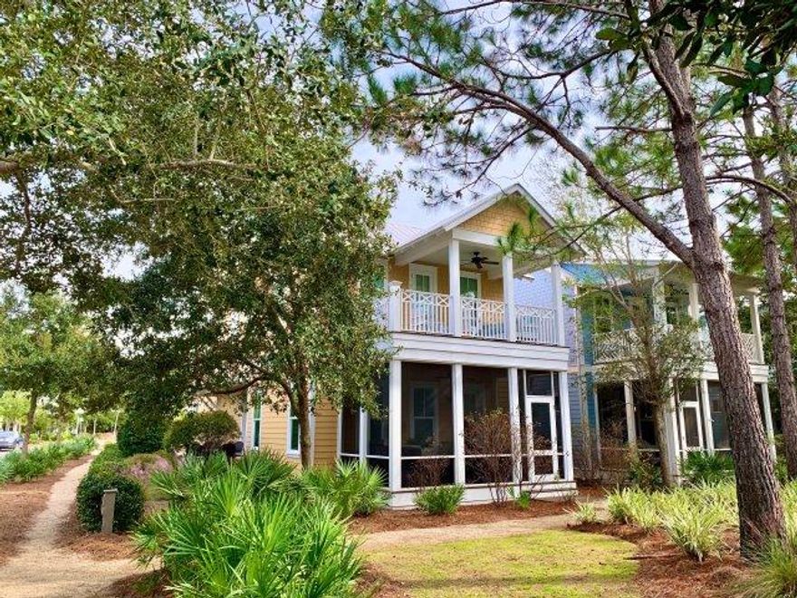 Never rented! Immaculately kept! This 5 bedrooms, 4.5 bath home with media/sitting room is located on the park in WaterColor Crossing's District. Situated on one of the largest corner lots the exterior space is built to entertain featuring expansive open deck space, screened-in porch overlooking the park, outdoor shower, grill pad with natural gas and a GOLF CART garage. The interior offers approximately 2,742 square feet and features high end finishes, 3 master bedrooms, hardwood flooring throughout, tile in baths/laundry,stone countertops, 10' ceilings on first floor and stainless steel appliances. The great room, kitchen, walk-in pantry, dining, custom bar area, half bath, laundry and master bedroom are situated on the first level. The second level features two master bedrooms (one with