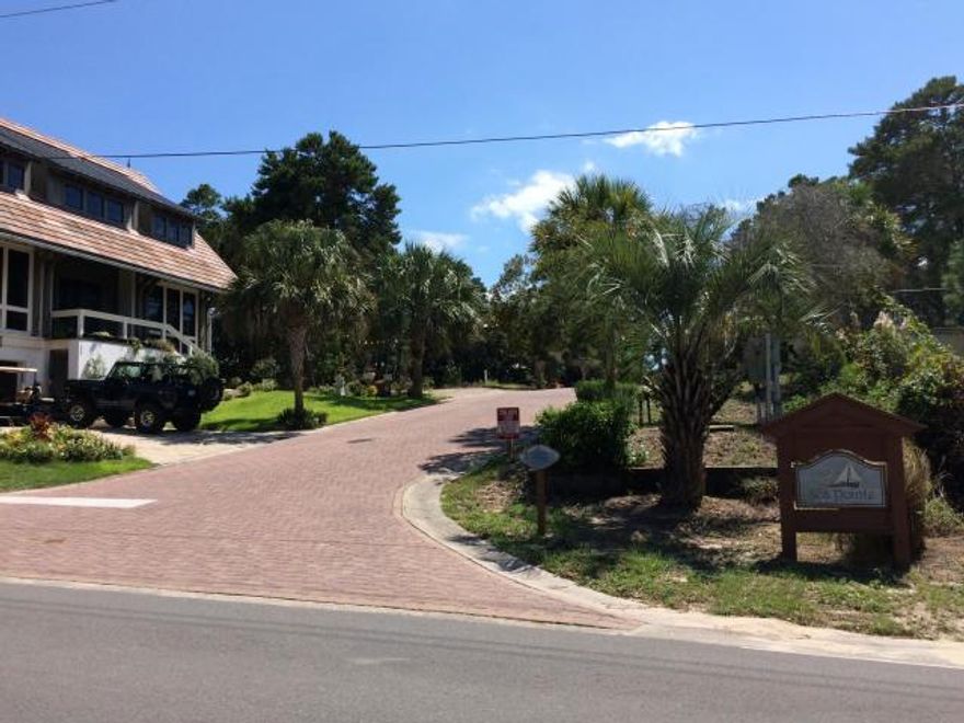 Easy access to the Beach one of the highest elevations in Dune Allen Beach. Located at the end of a private drive in the community of Sea Pointe, which contains only 9 lots. A three story home will have Gulf Views (see photo's taken from third floor of adjacent home).